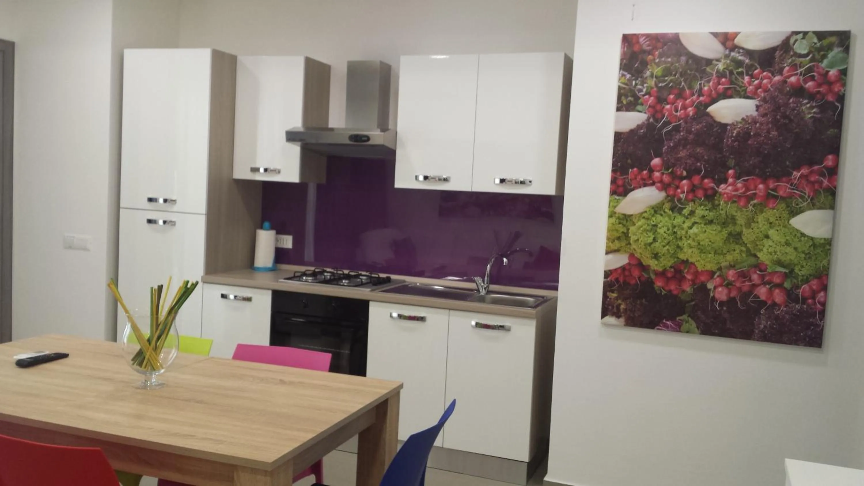 Kitchen or kitchenette in Residence Palazzo dei Delfini by RECEPTIO