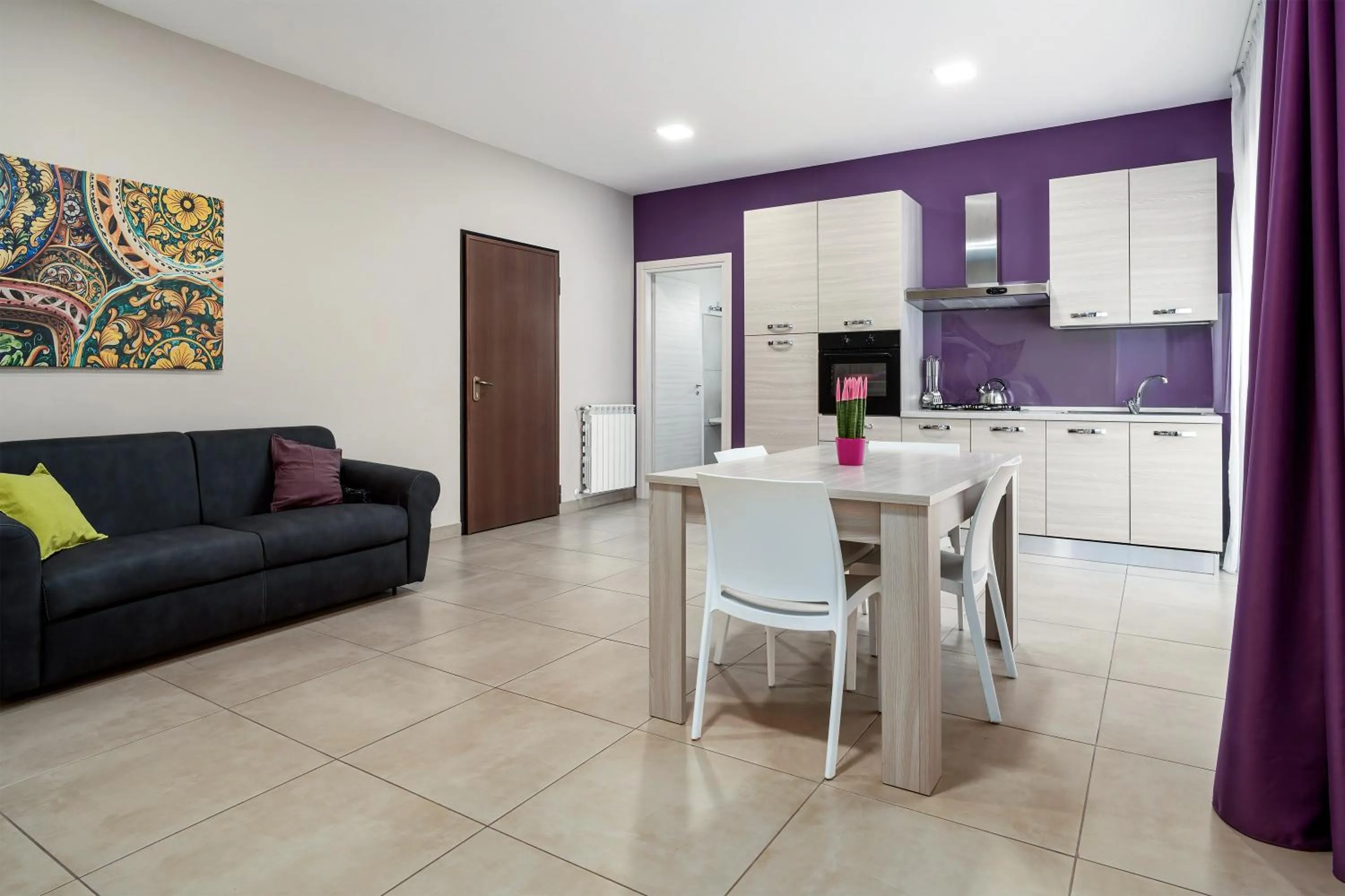 Kitchen or kitchenette in Residence Palazzo dei Delfini by RECEPTIO