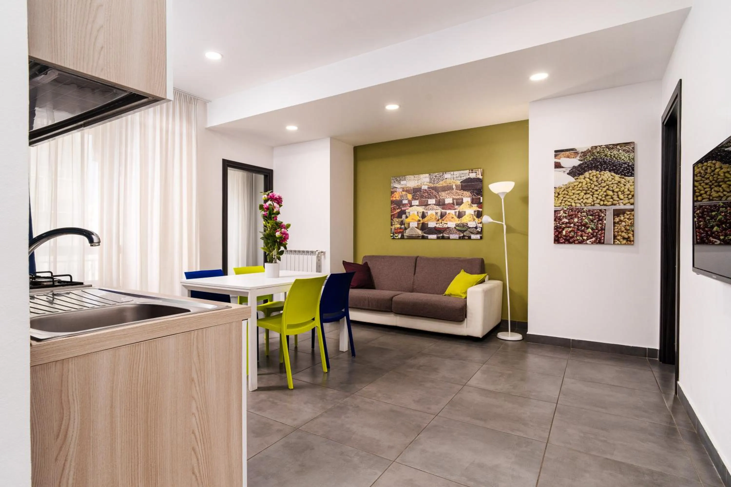 Living room in Residence Palazzo dei Delfini by RECEPTIO