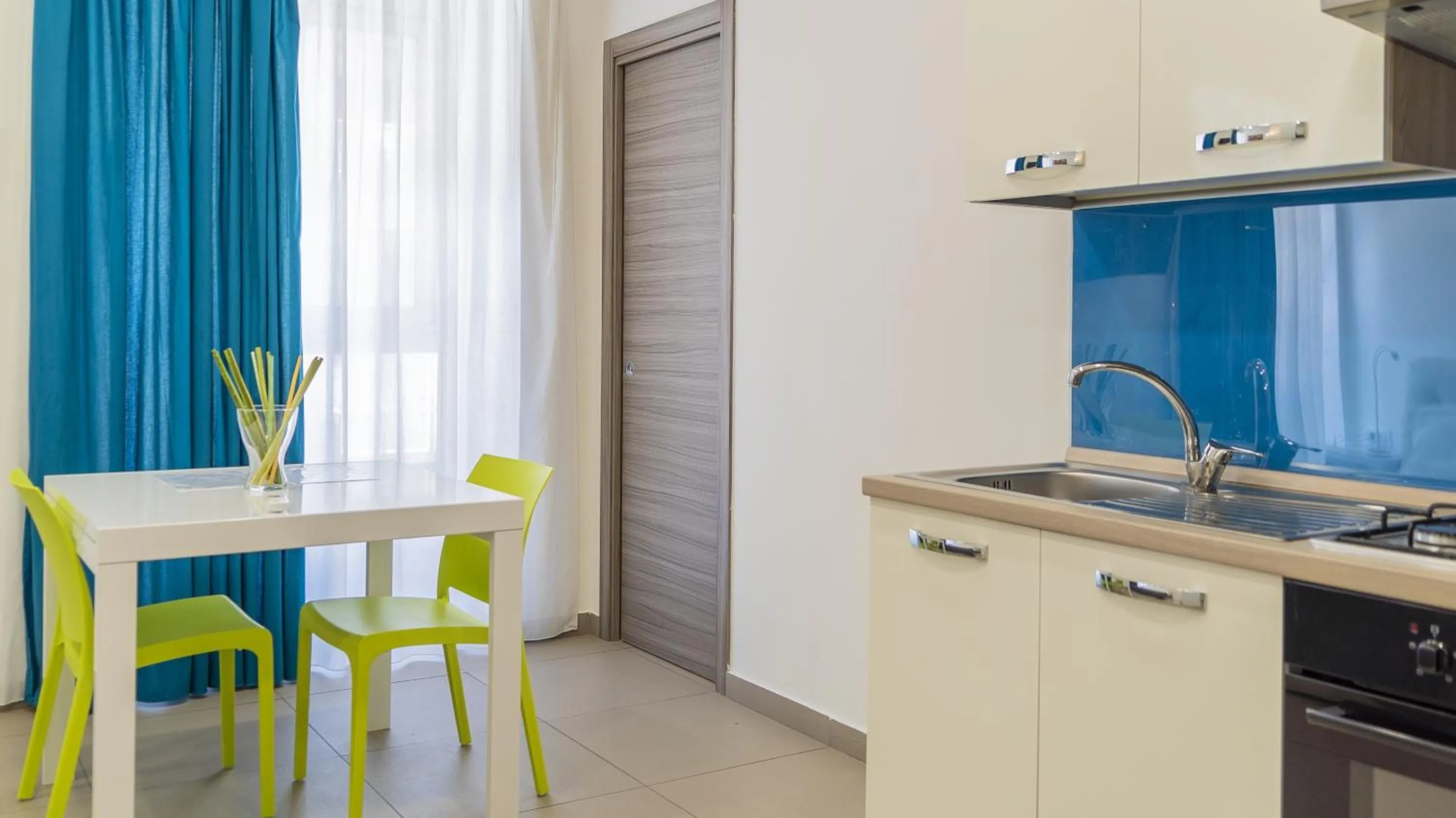 Kitchen or kitchenette in Residence Palazzo dei Delfini by RECEPTIO
