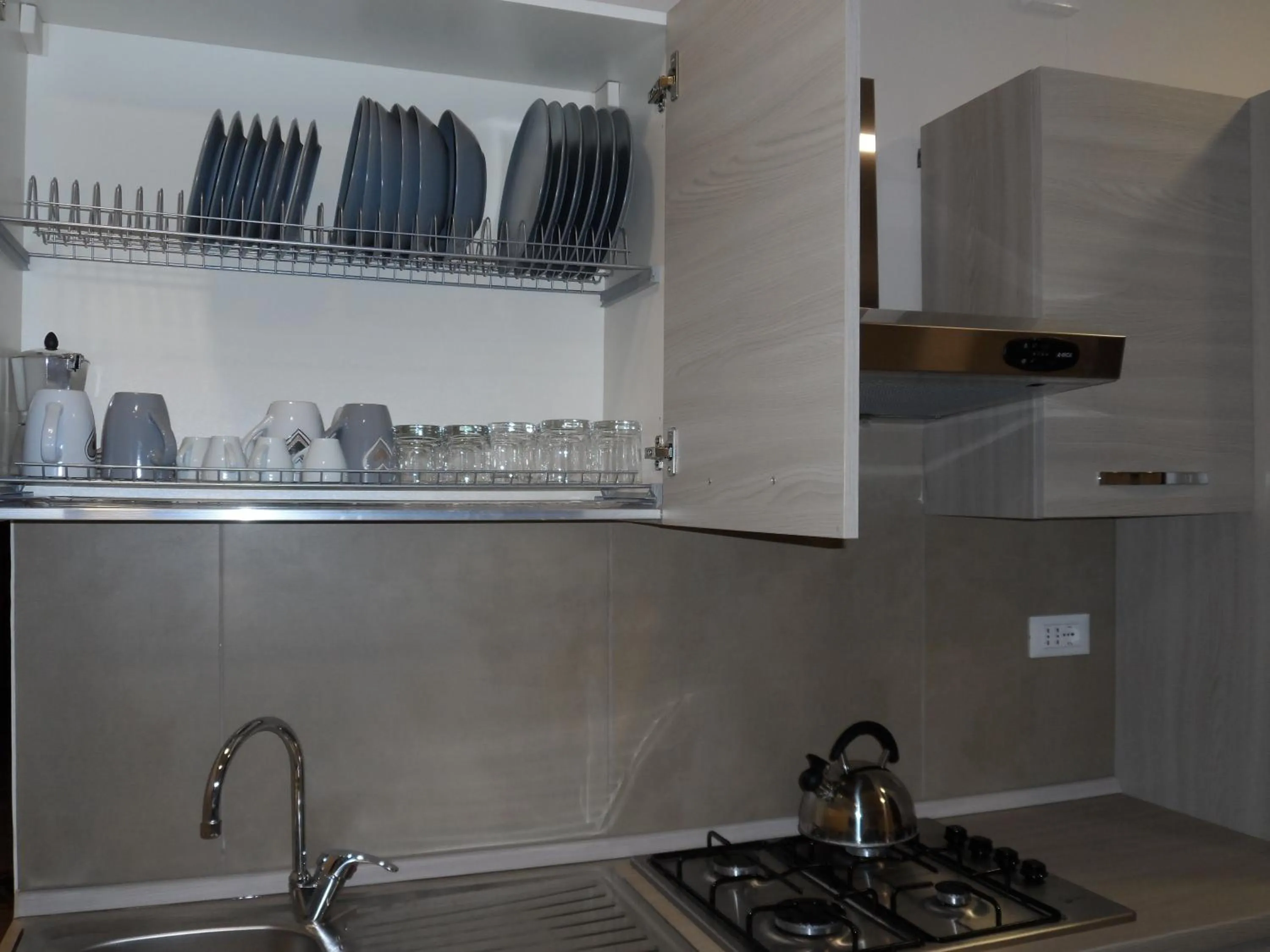 Kitchen or kitchenette in Residence Palazzo dei Delfini by RECEPTIO