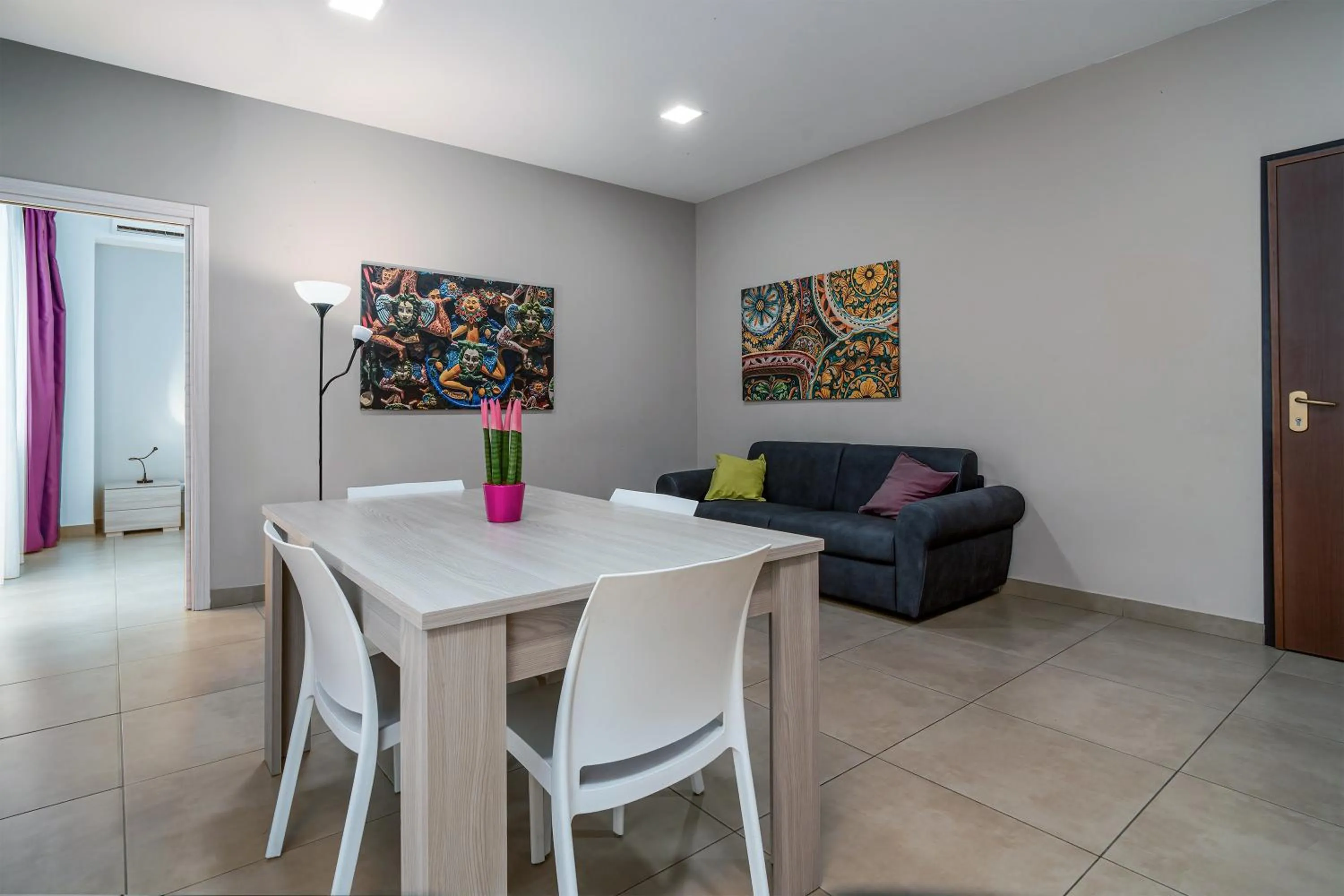 Living room in Residence Palazzo dei Delfini by RECEPTIO