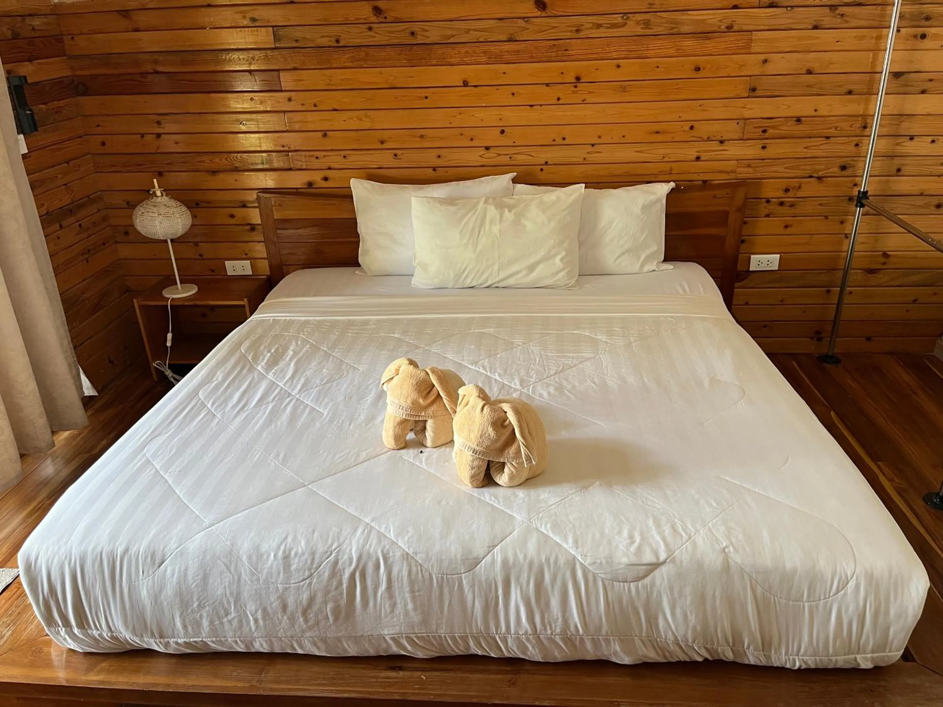 Bed in A-Na-Lay Resort Koh Kood