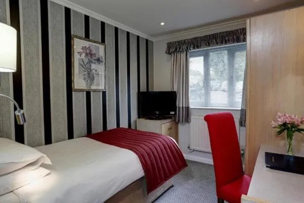 Bed in The Birch Hotel