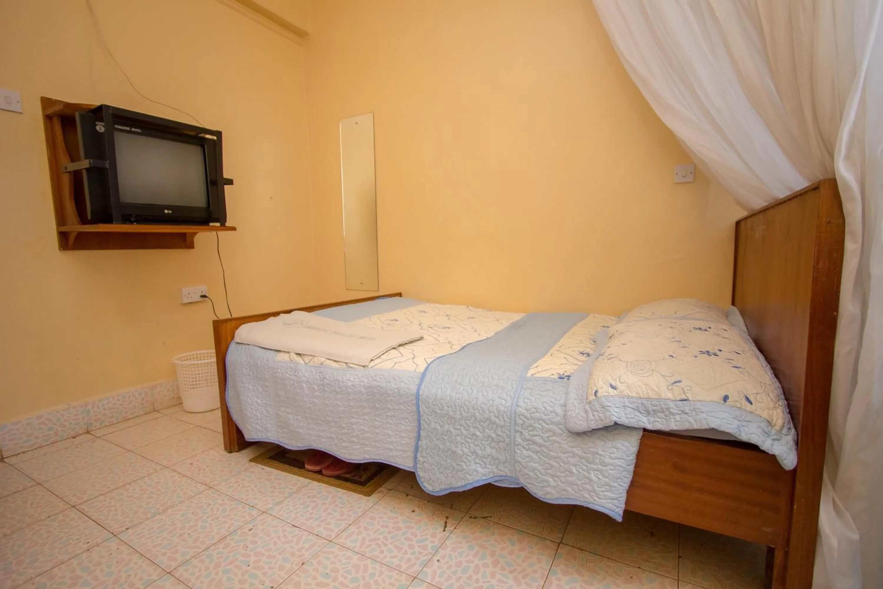 Bed in Jamindas Paradise Motel