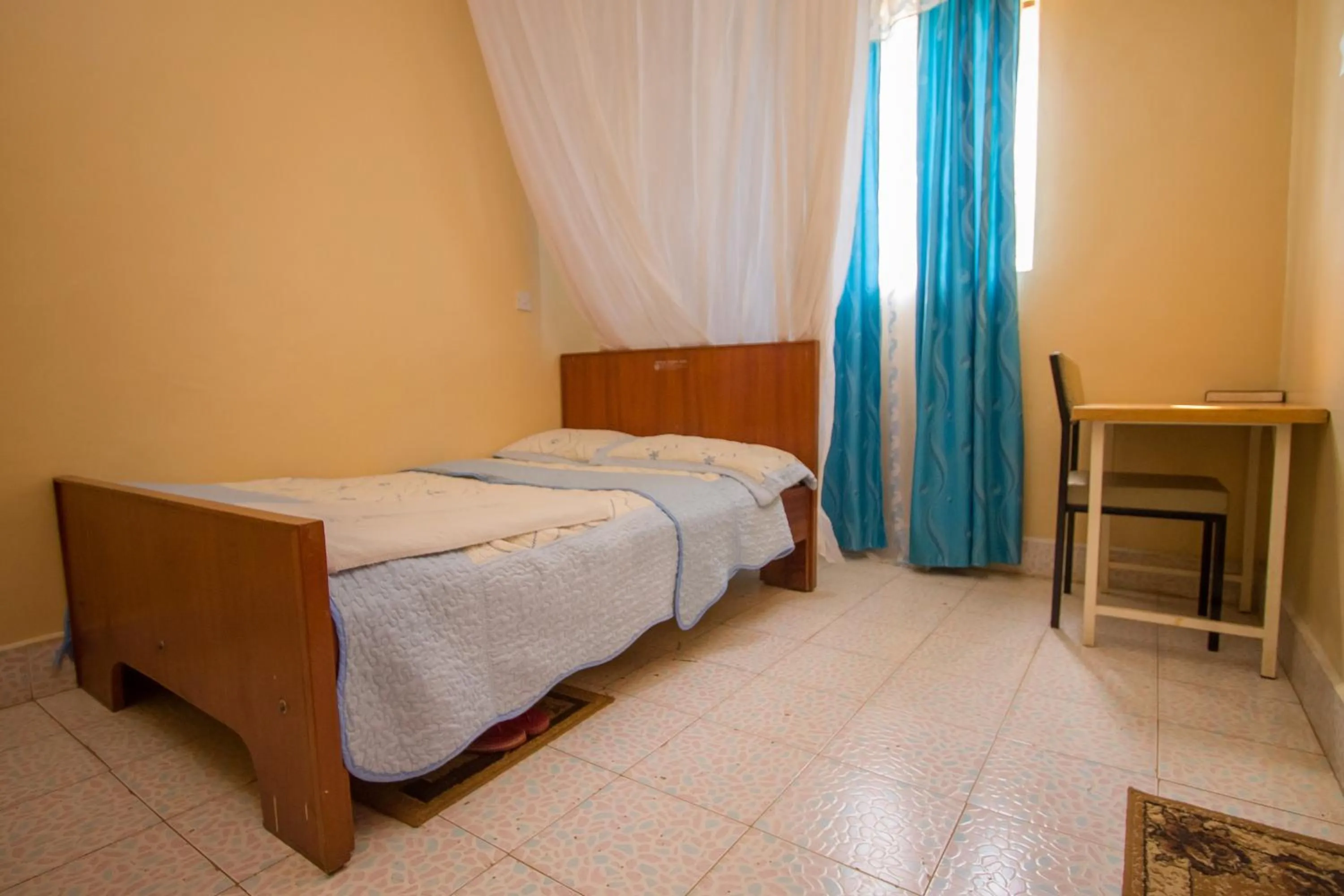 Bed in Jamindas Paradise Motel