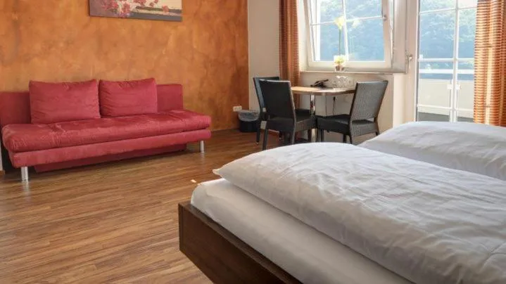 Bed in Garni Hotel Henn