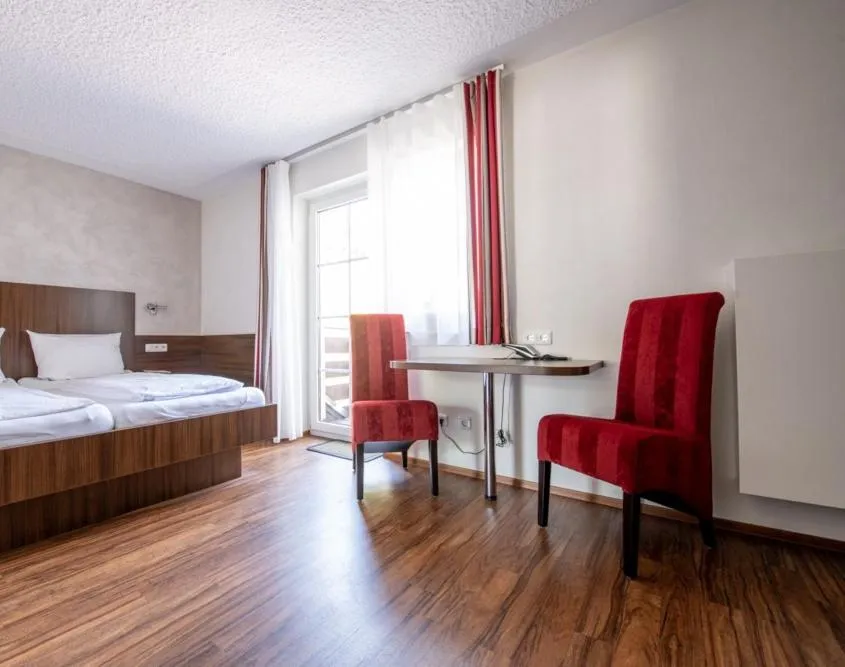 Bed in Garni Hotel Henn