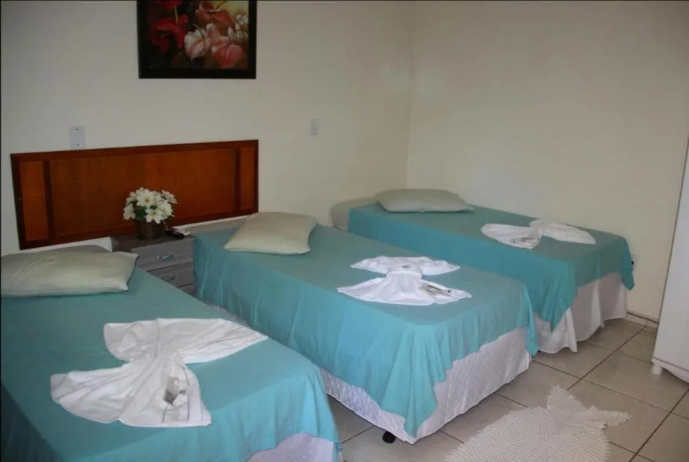 Bed in Hotel Pousada João 3.16