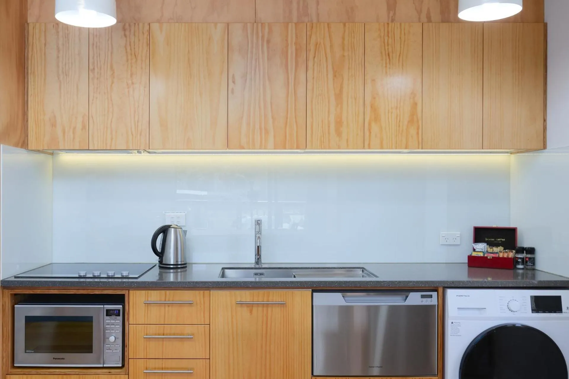 Kitchen or kitchenette in Kaiteriteri Recreation Reserve Apartments