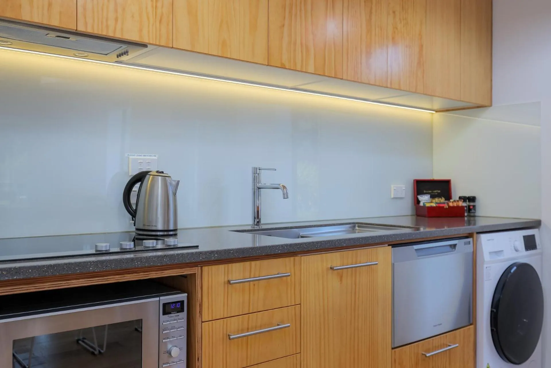 Kitchen or kitchenette in Kaiteriteri Recreation Reserve Apartments