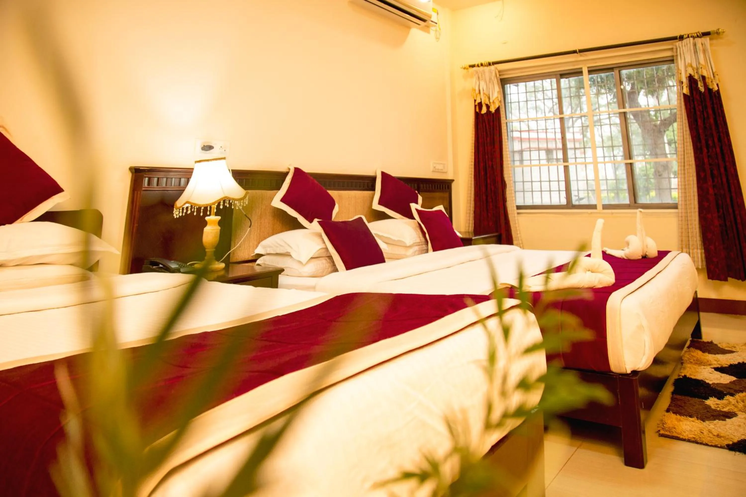 Bed in KSTDC Hotel Mayura Chalukya, Badami