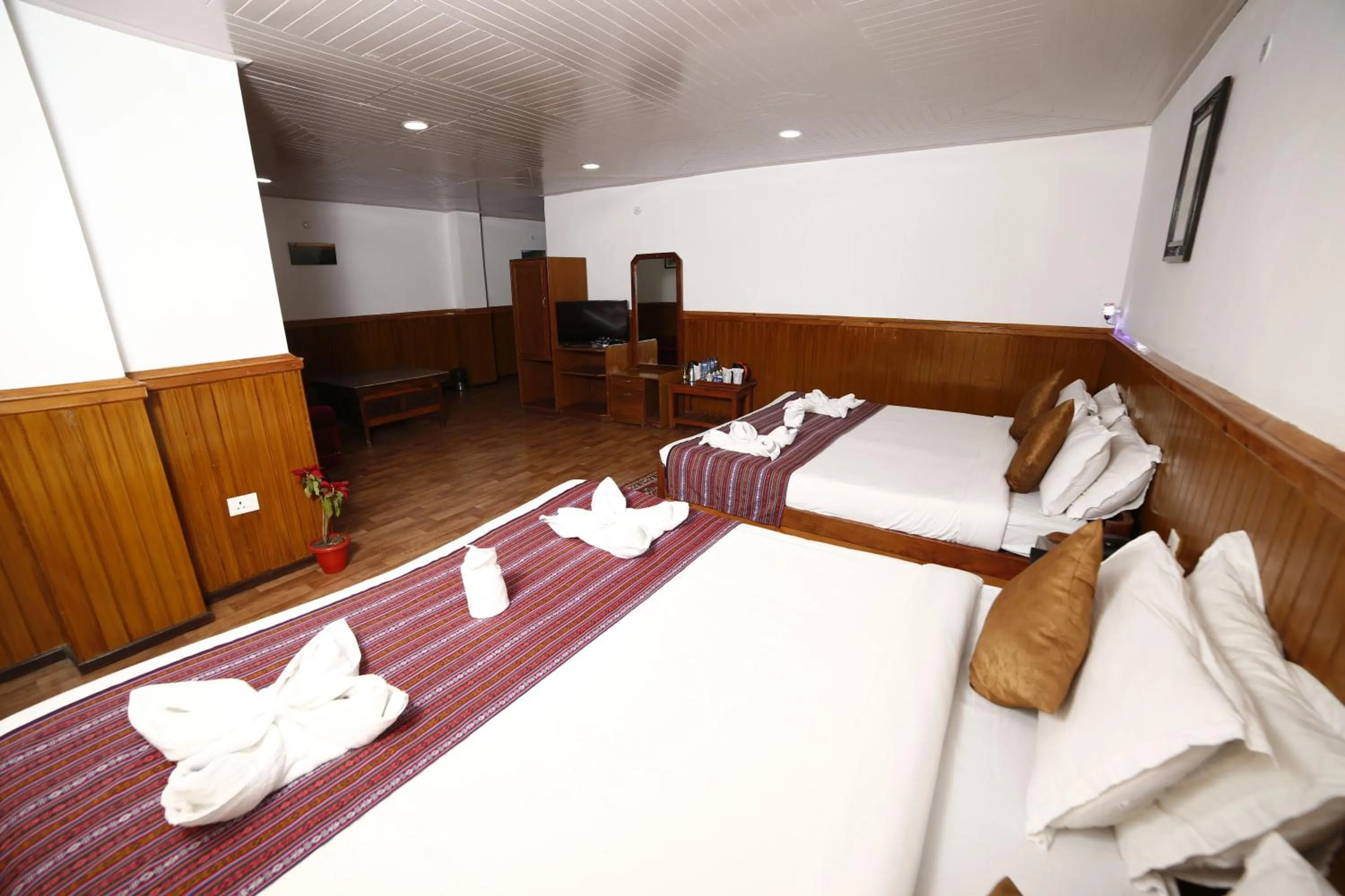 Bed in Yangthang Dzimkha Resort