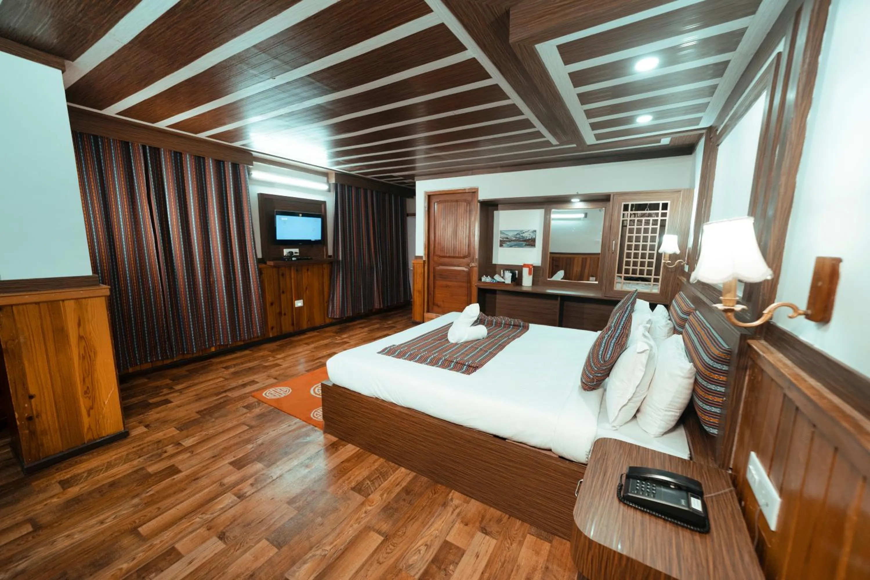 Bed in Yangthang Dzimkha Resort