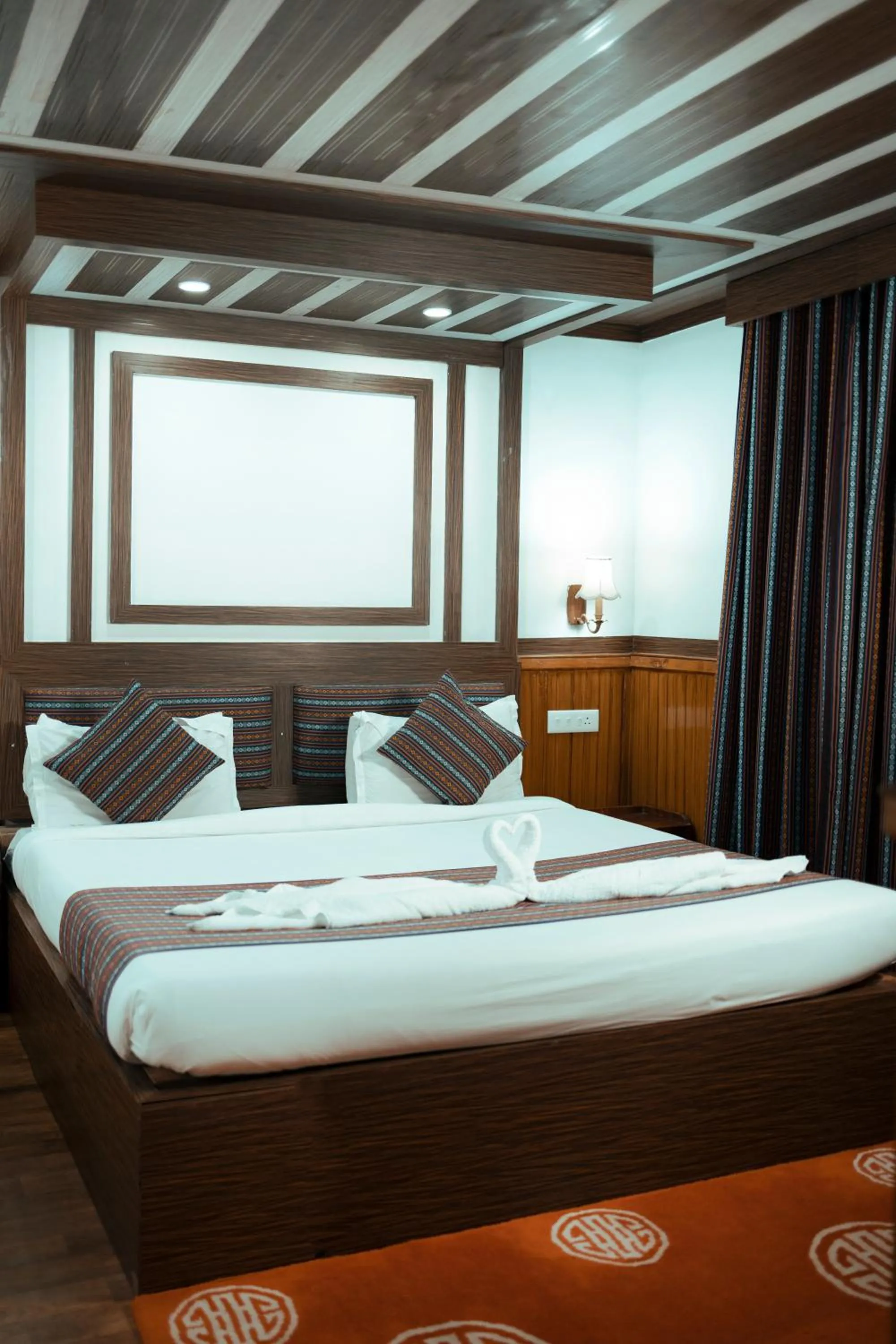 Bed in Yangthang Dzimkha Resort