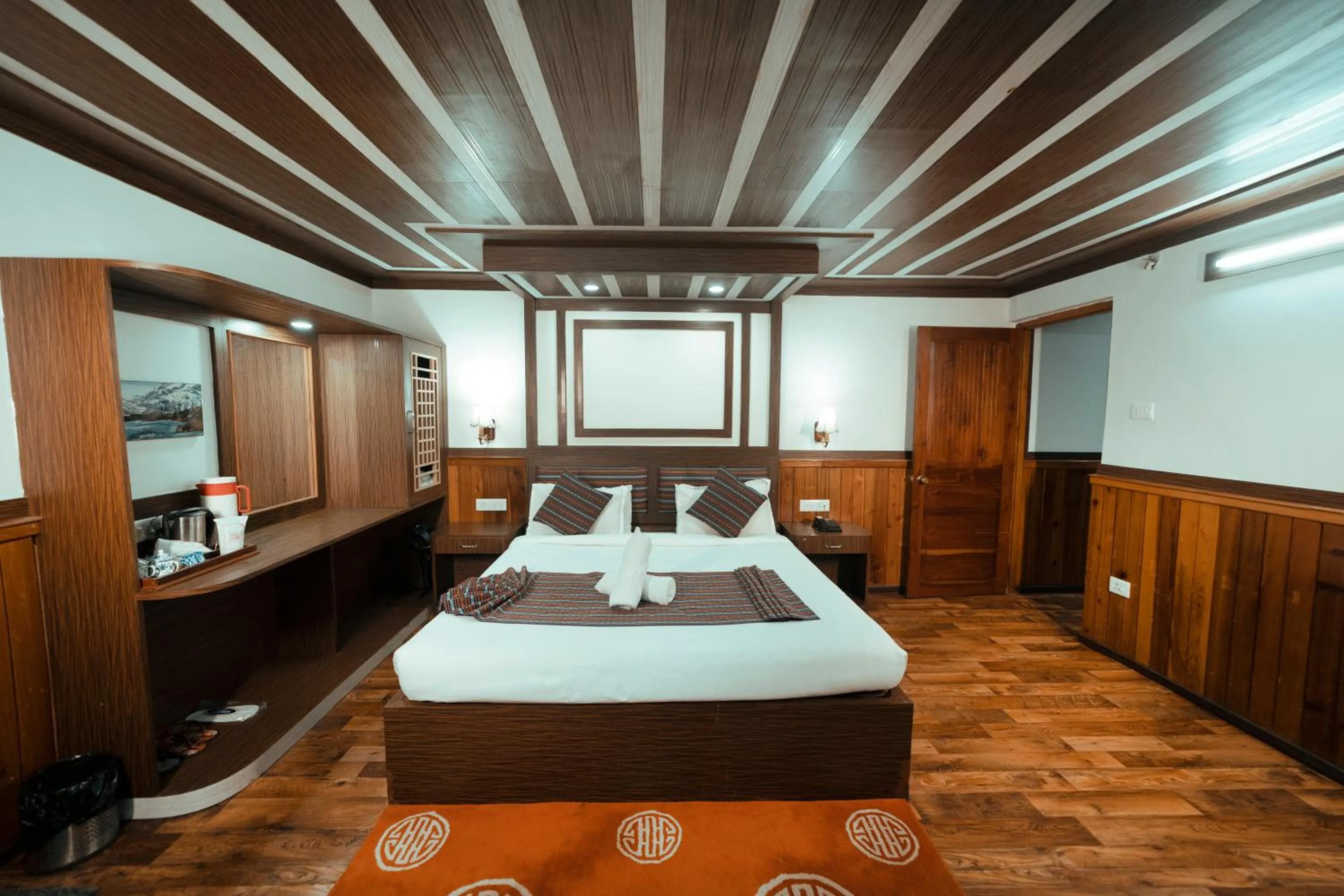 Bed in Yangthang Dzimkha Resort