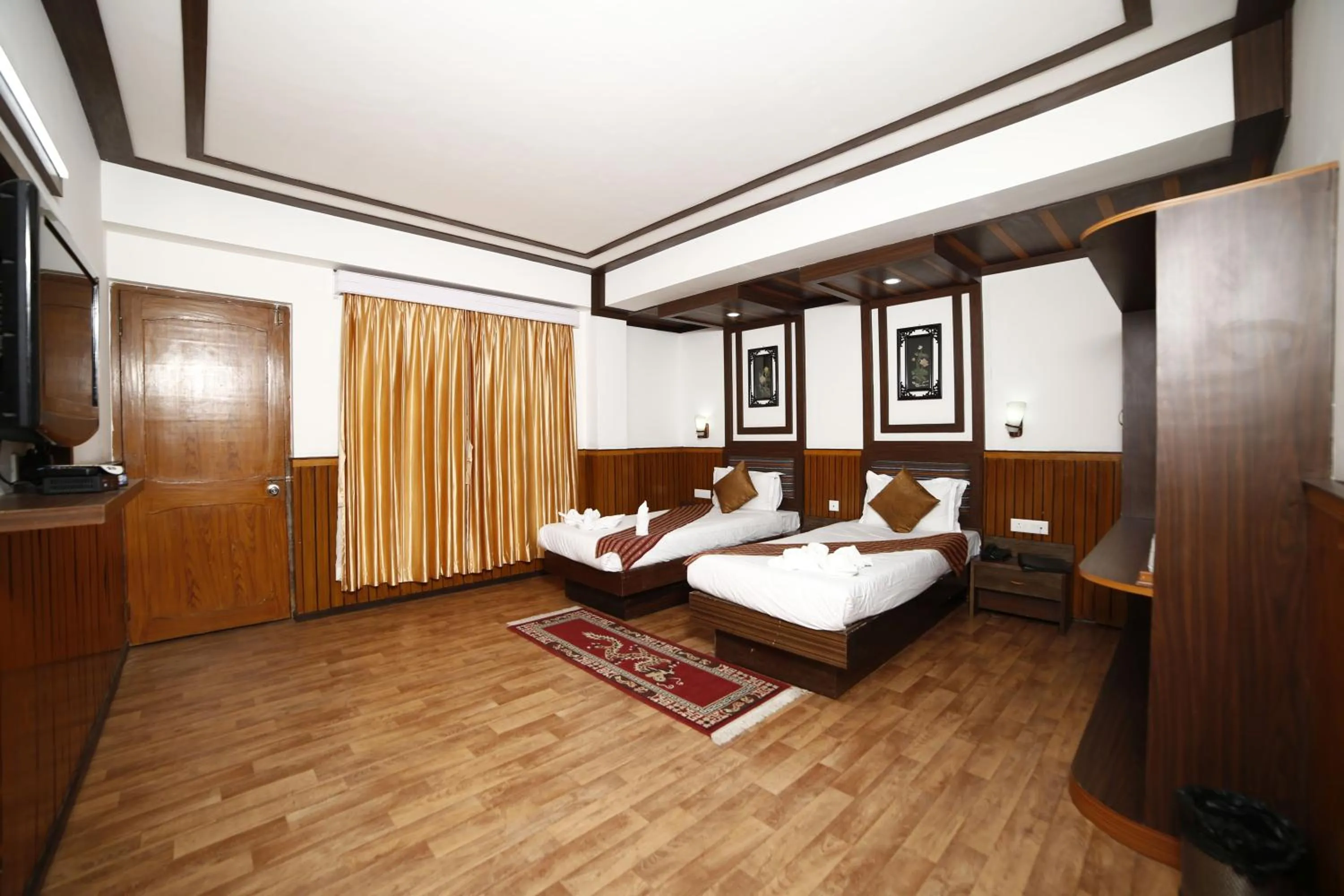 Bed in Yangthang Dzimkha Resort