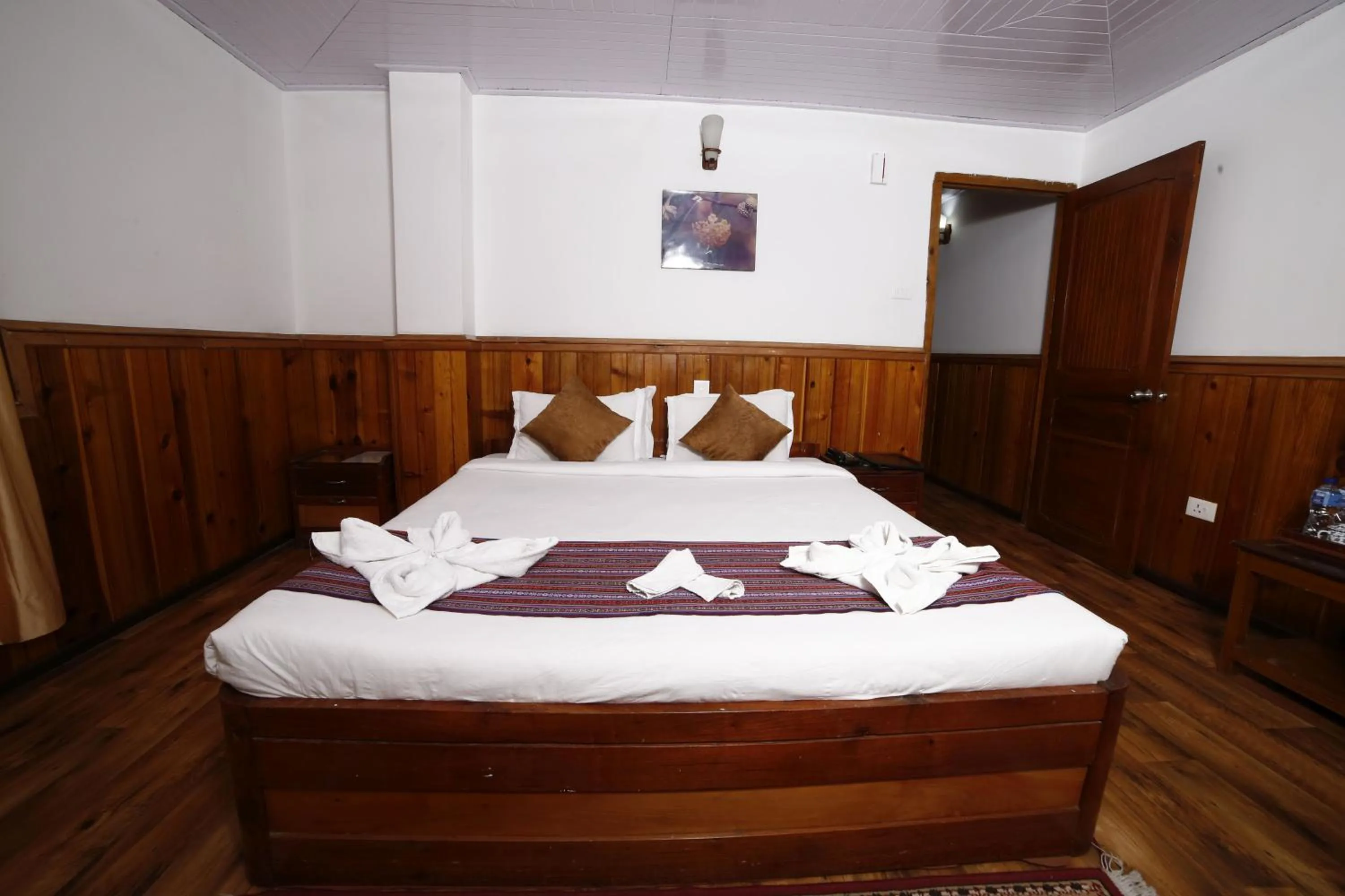 Bed in Yangthang Dzimkha Resort