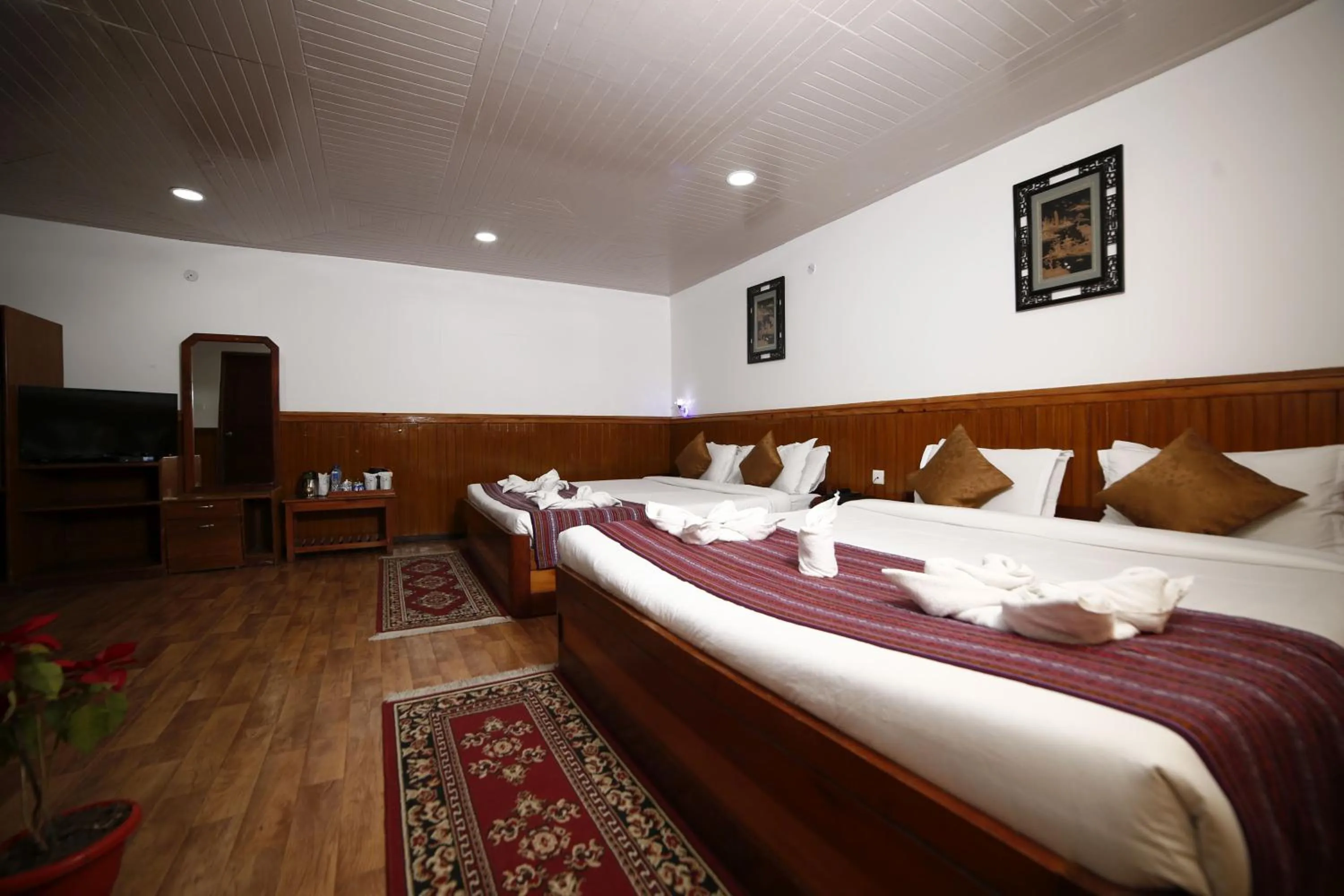 Bed in Yangthang Dzimkha Resort