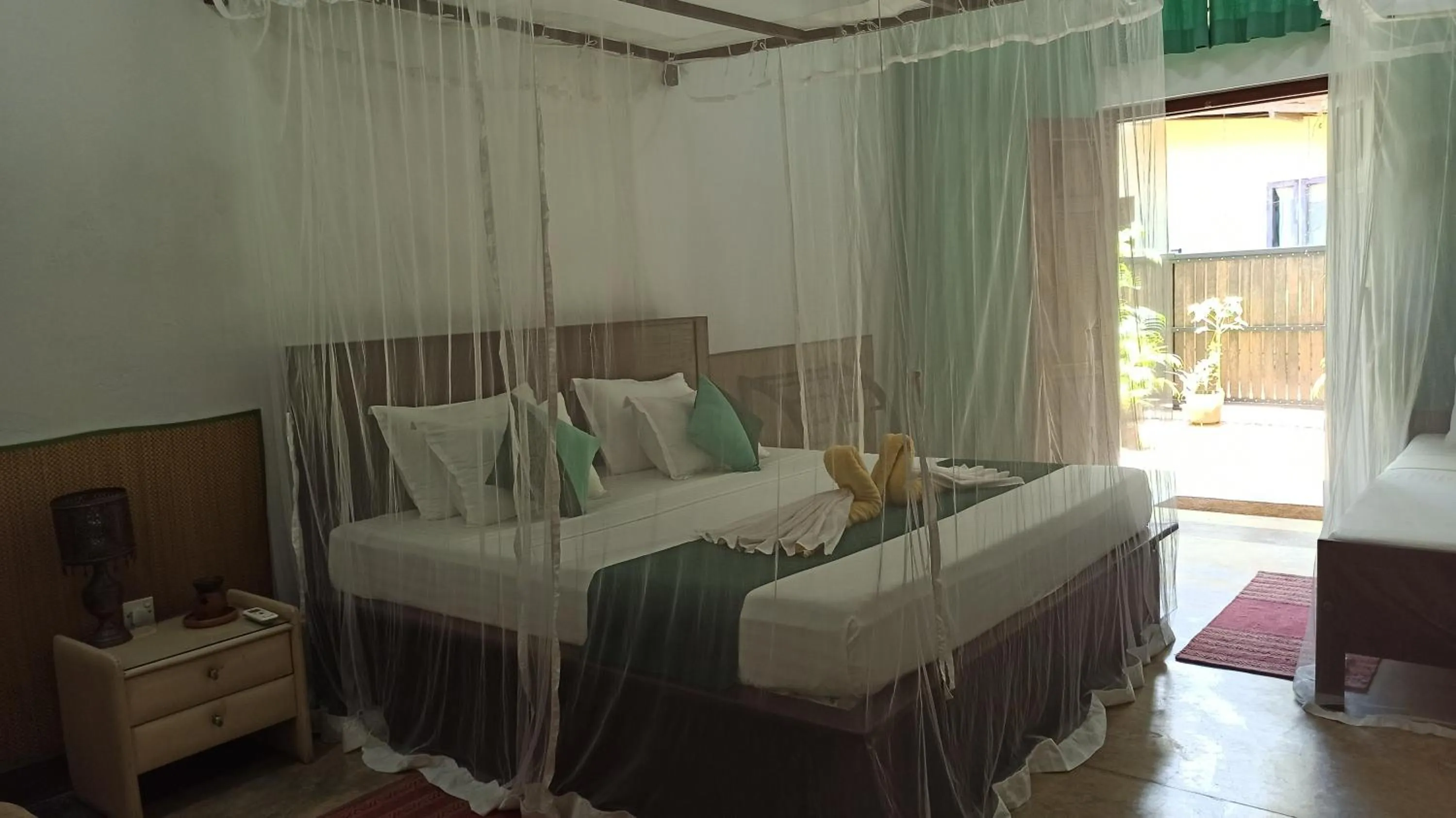 Photo of the whole room, Bed in Butterfly Jewel