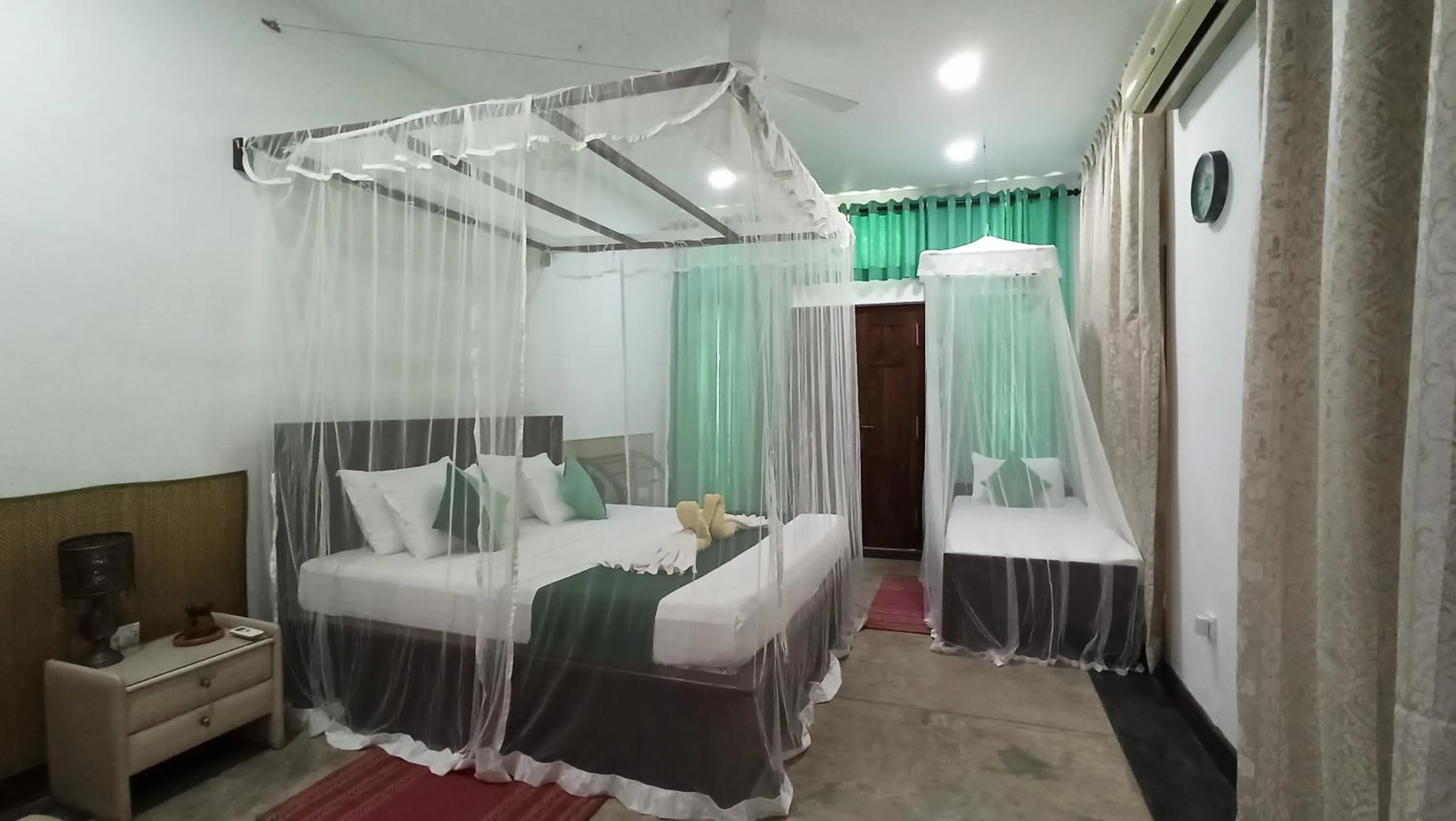 Photo of the whole room, Bed in Butterfly Jewel