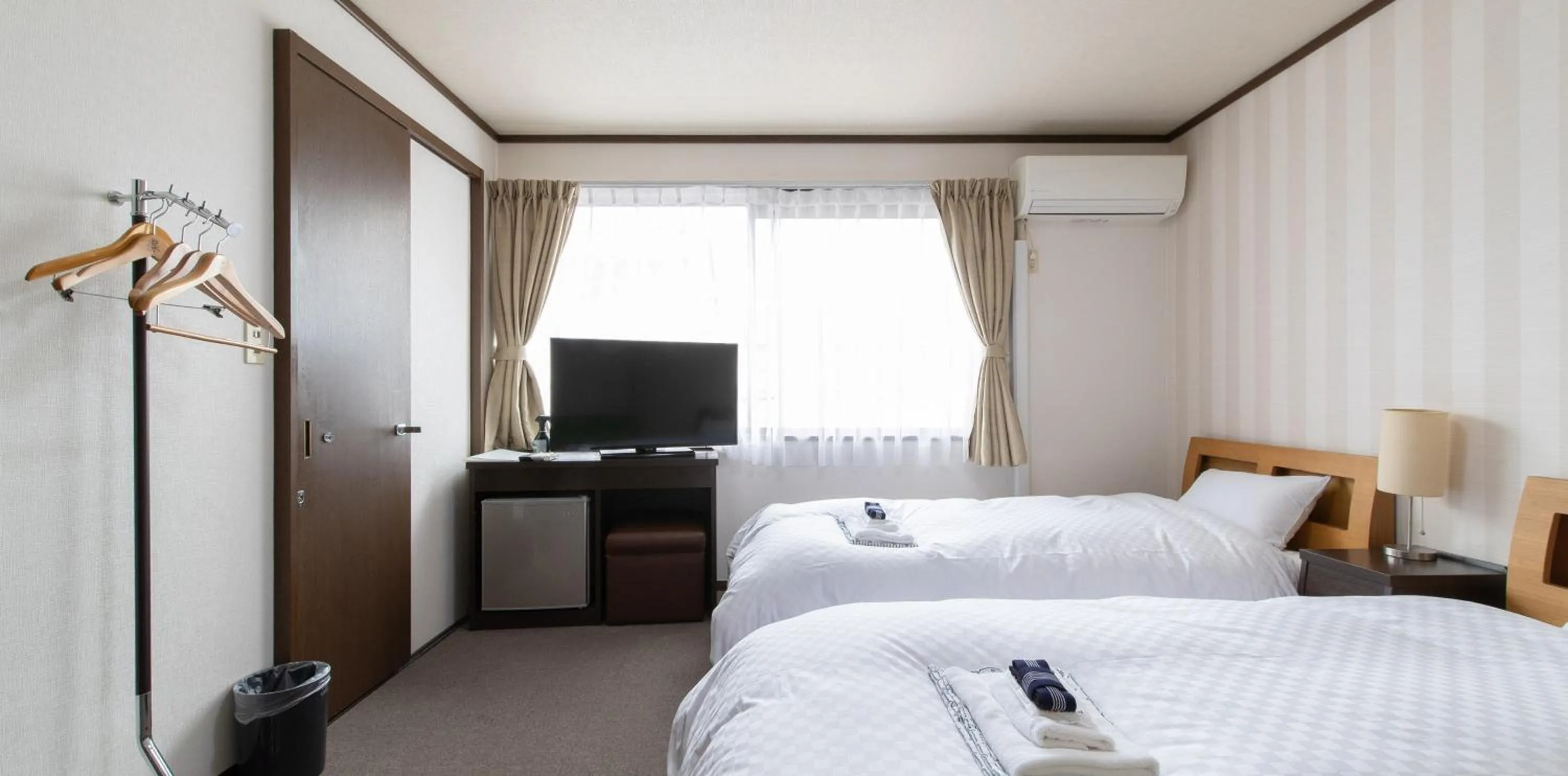 Photo of the whole room, Bed in Tabist Yamaga Onsen Yuyado Izumi