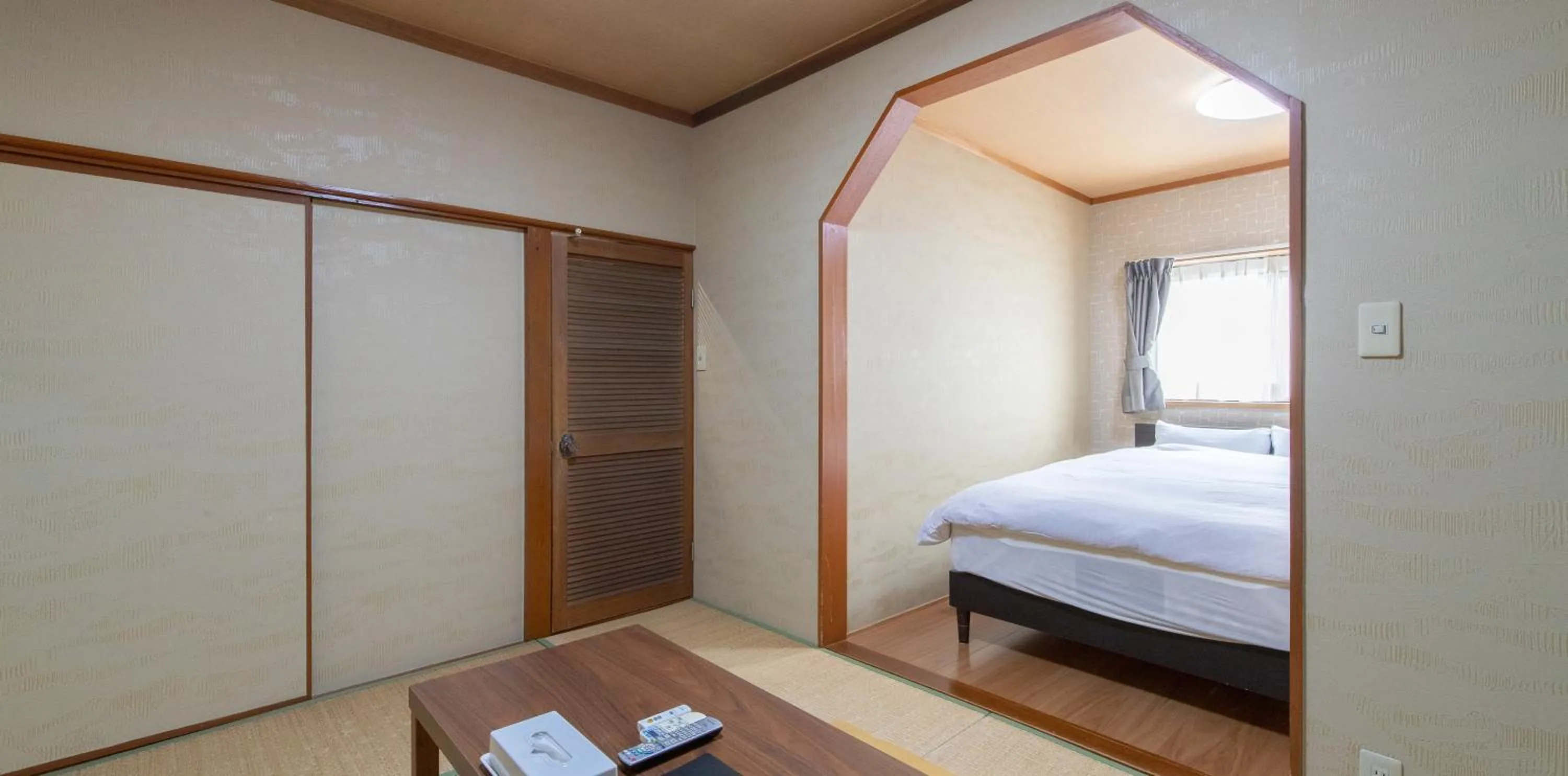 Photo of the whole room, Bed in Tabist Yamaga Onsen Yuyado Izumi