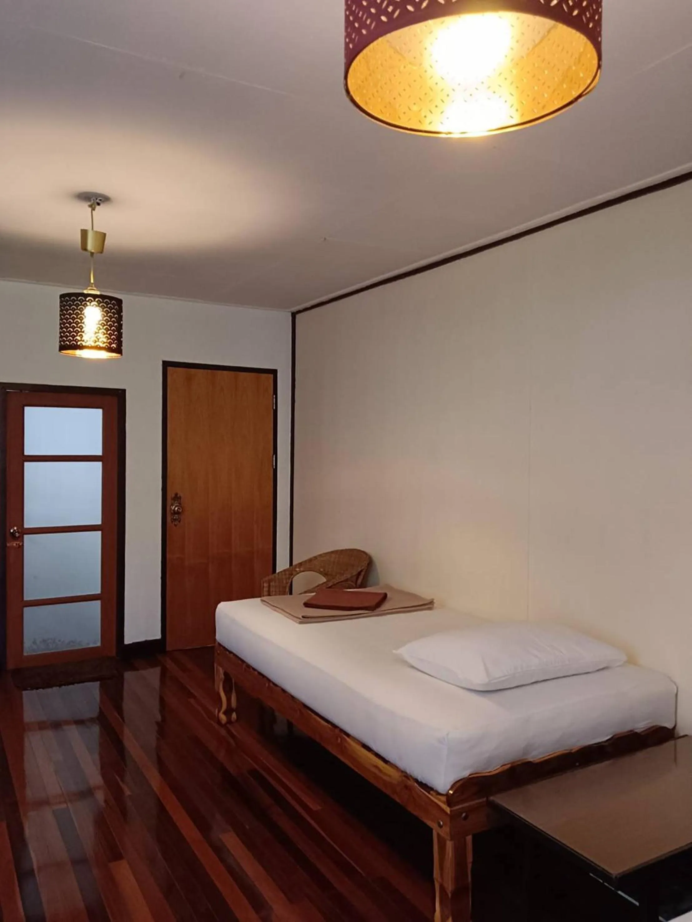 Bed in Naturbliss Resort Village