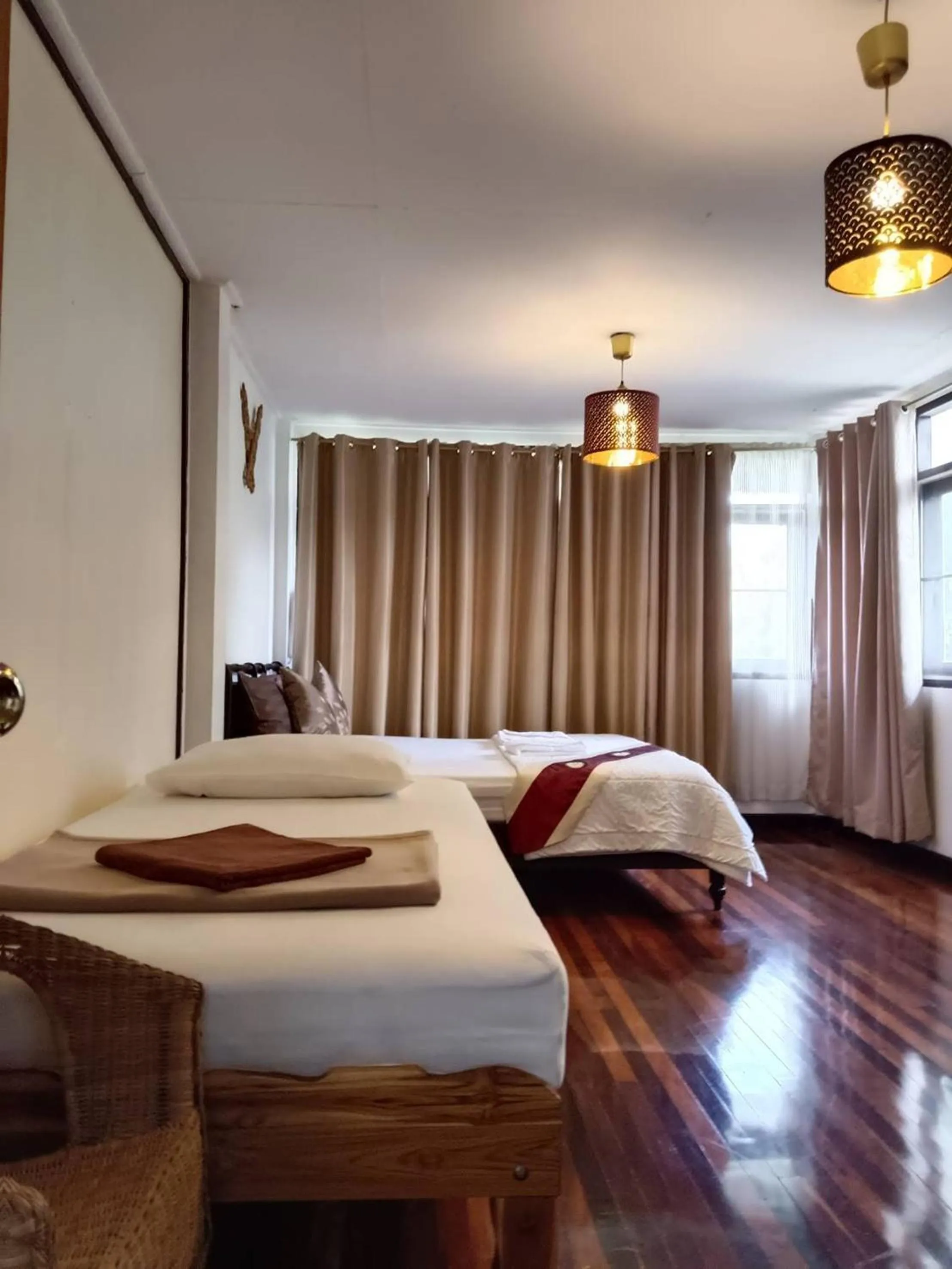 Bed in Naturbliss Resort Village