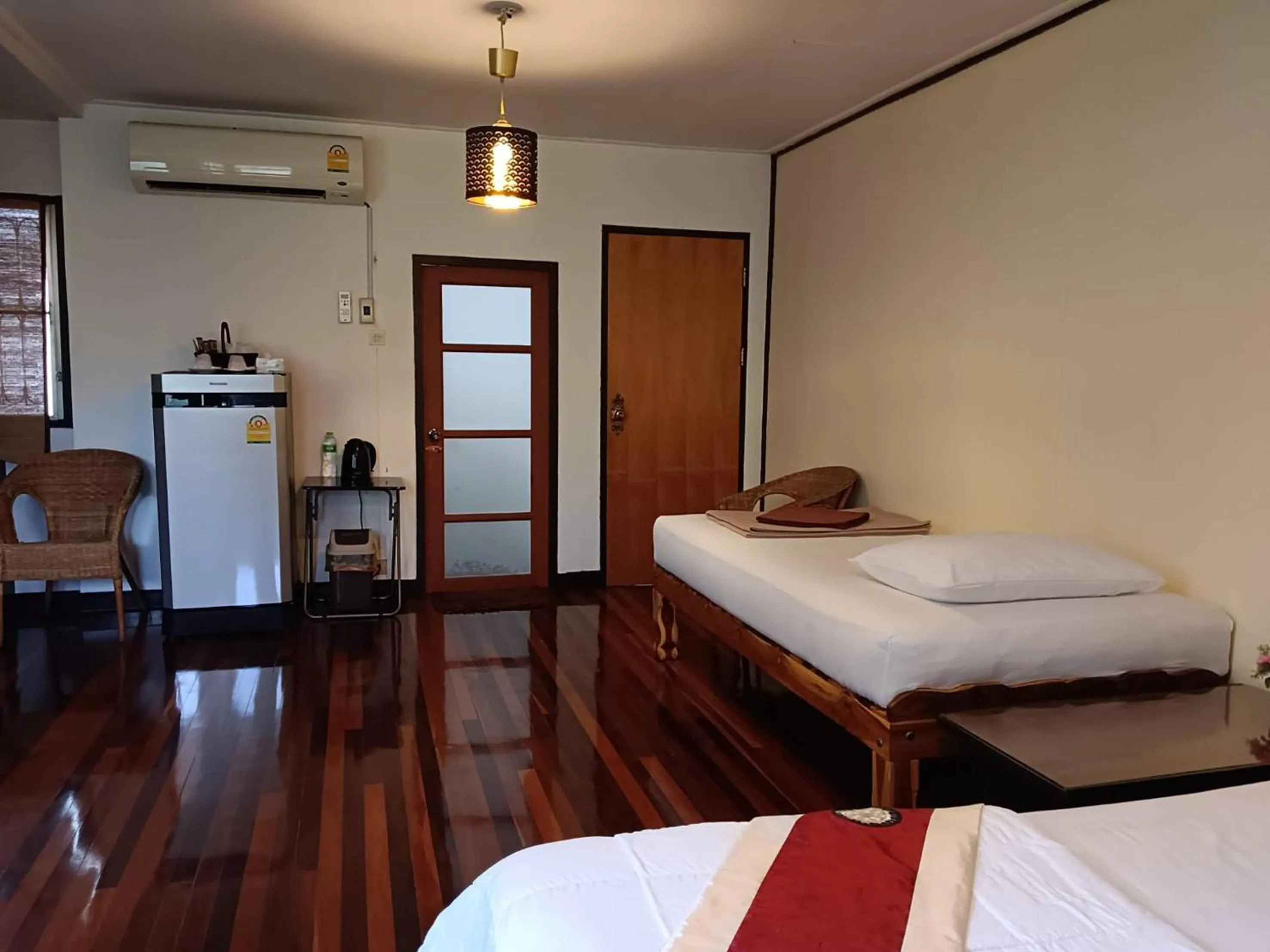 Bed in Naturbliss Resort Village