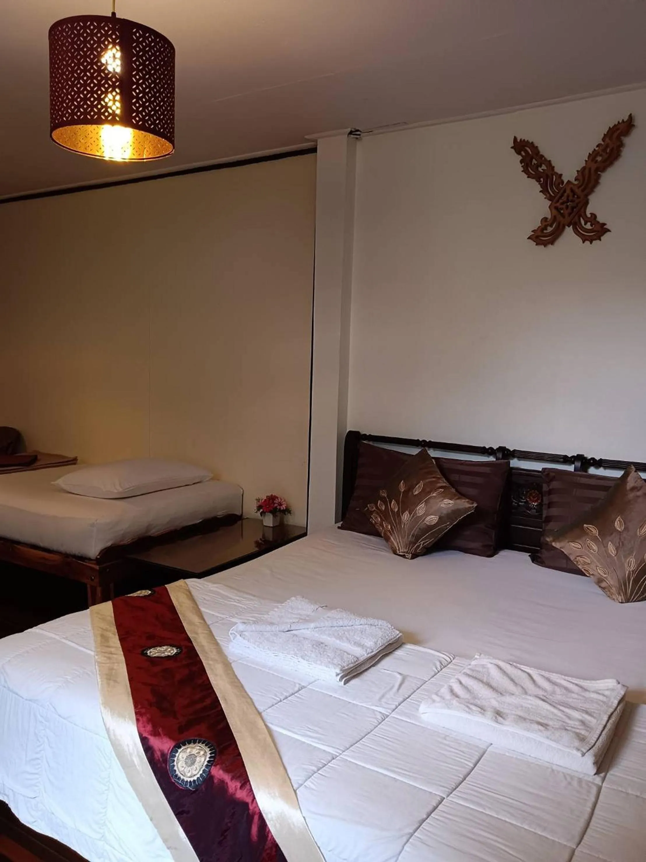 Bed in Naturbliss Resort Village