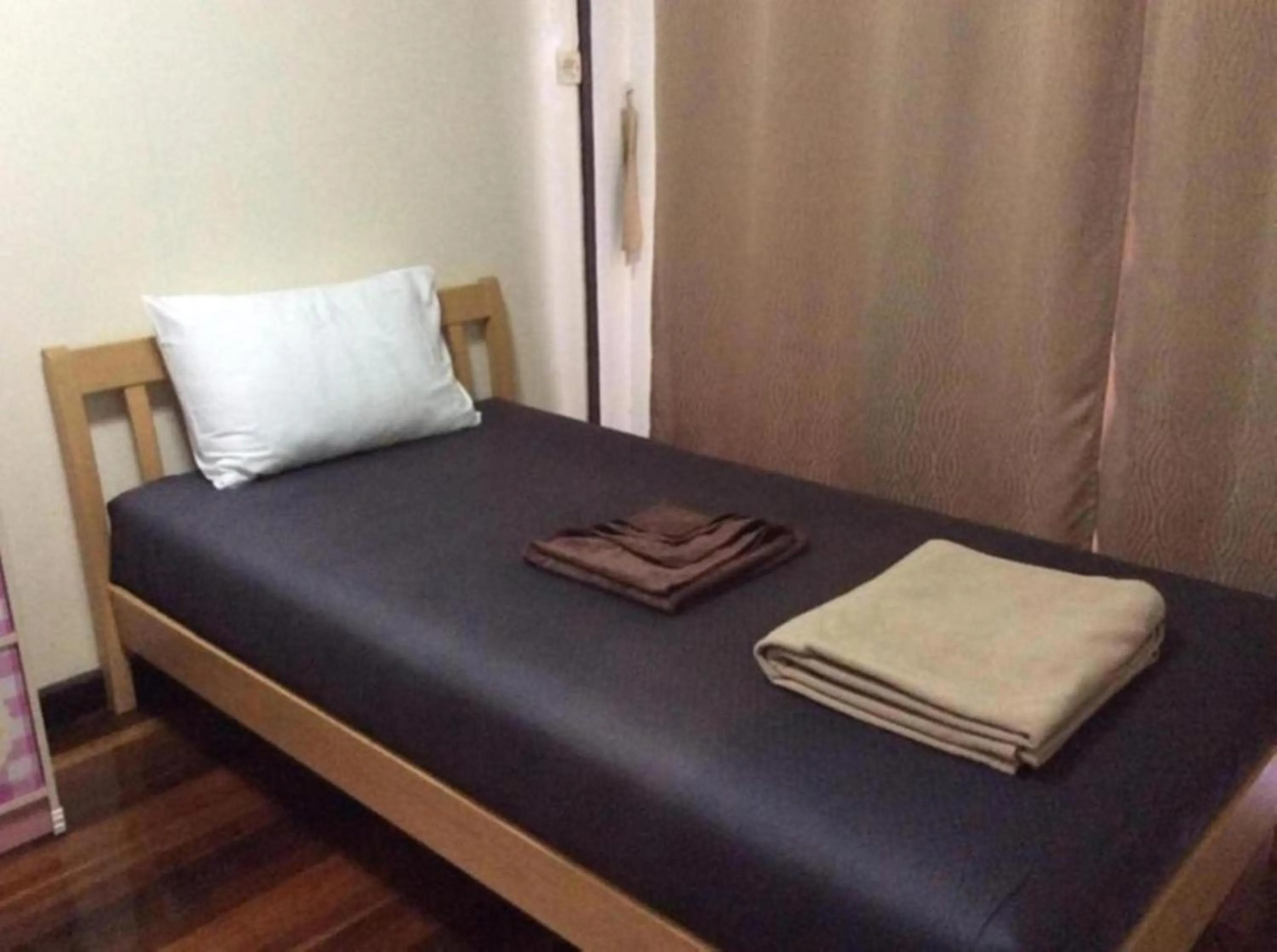 Bed in Naturbliss Resort Village