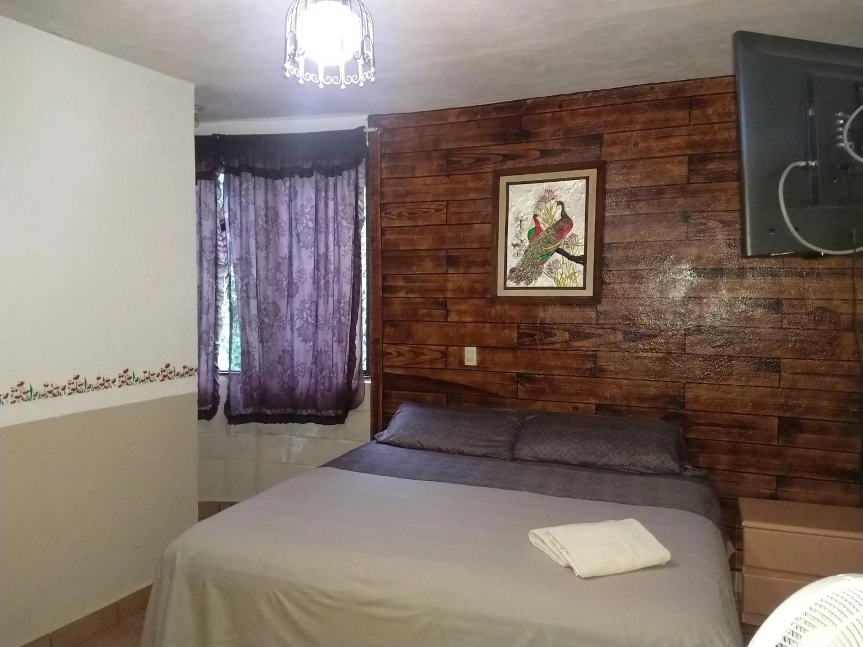 Bed in Hospedaje San Antonio Tepoztlán.