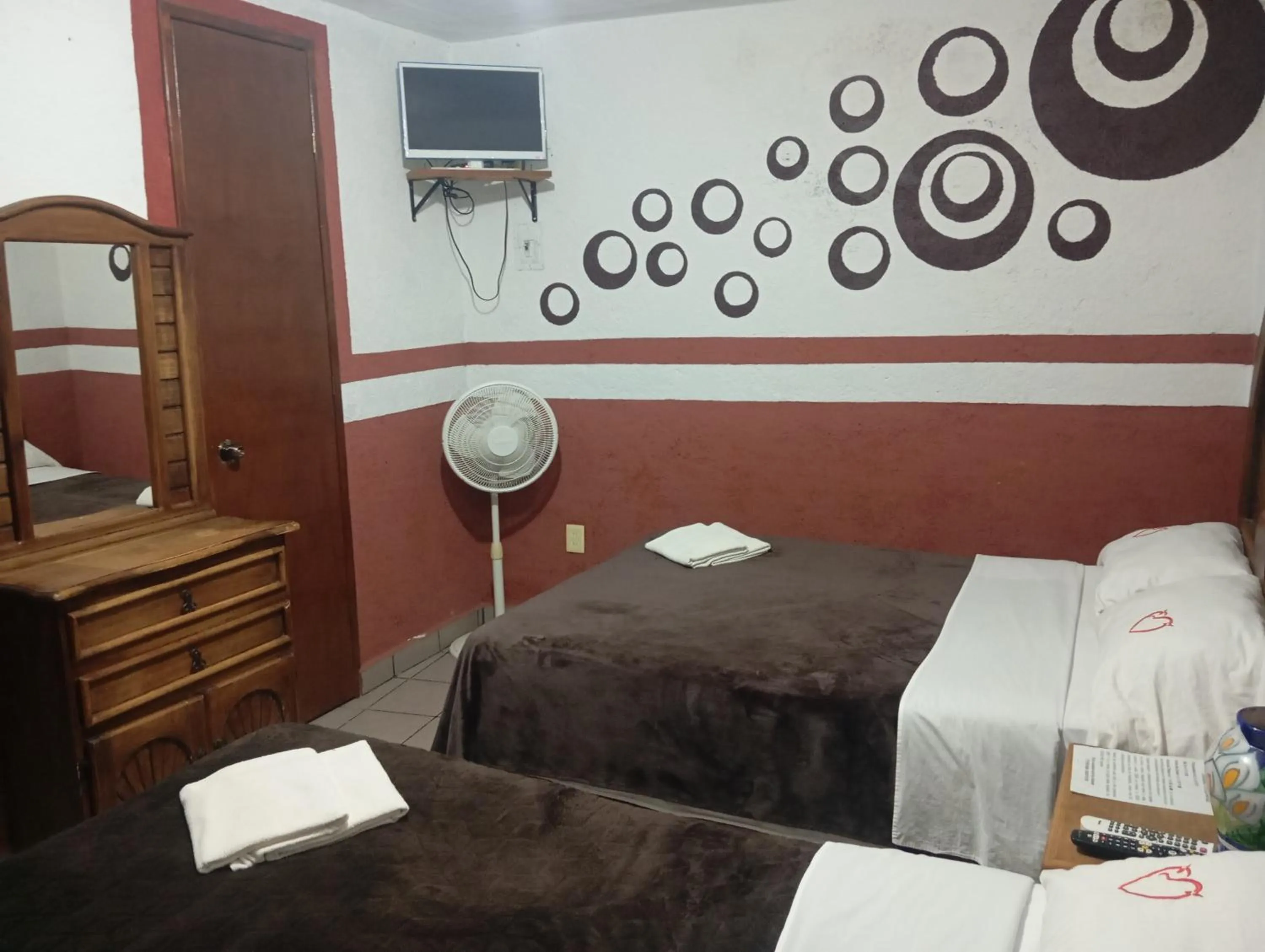 Bed in Hospedaje San Antonio Tepoztlán.