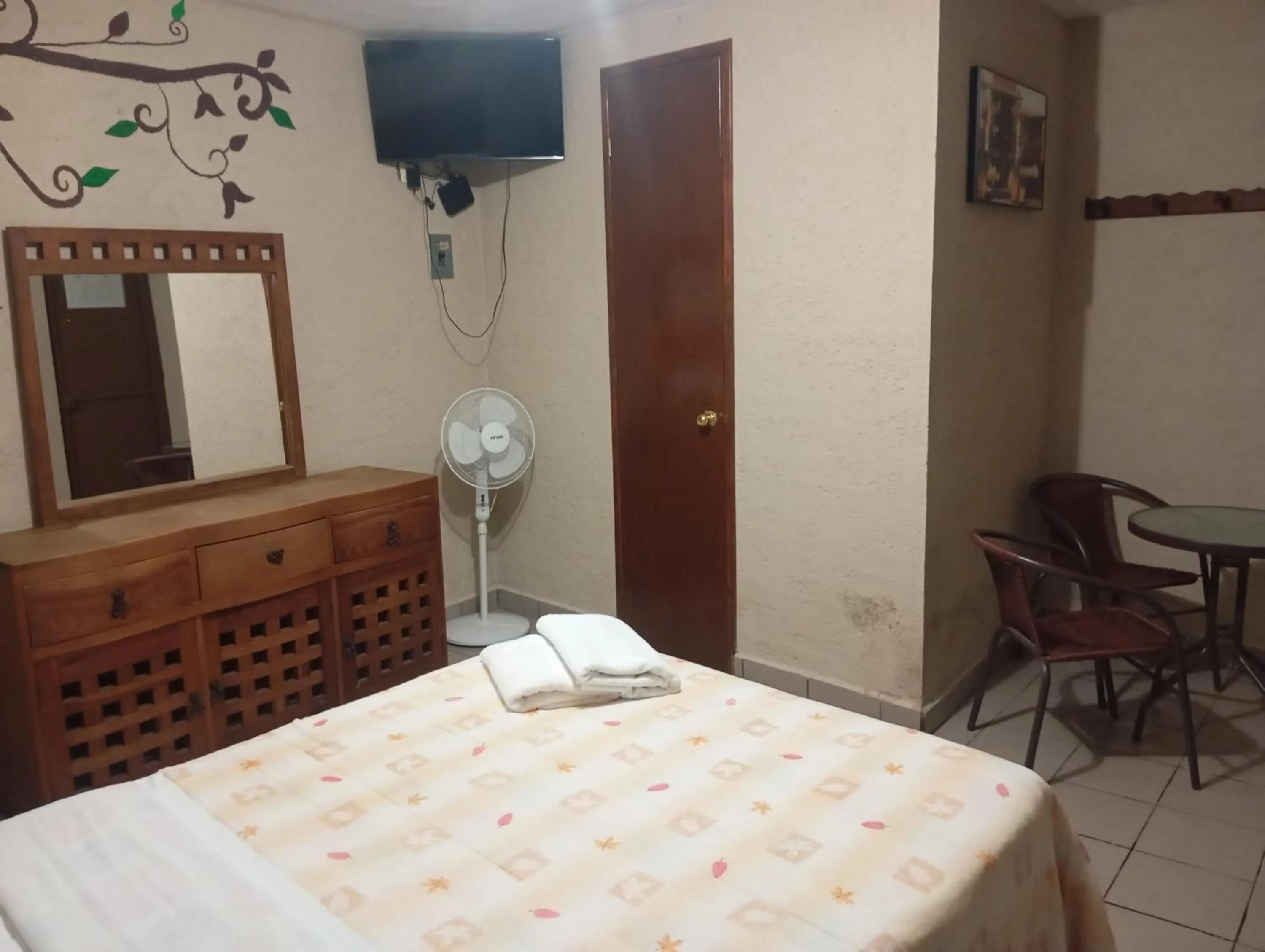 Bed in Hospedaje San Antonio Tepoztlán.