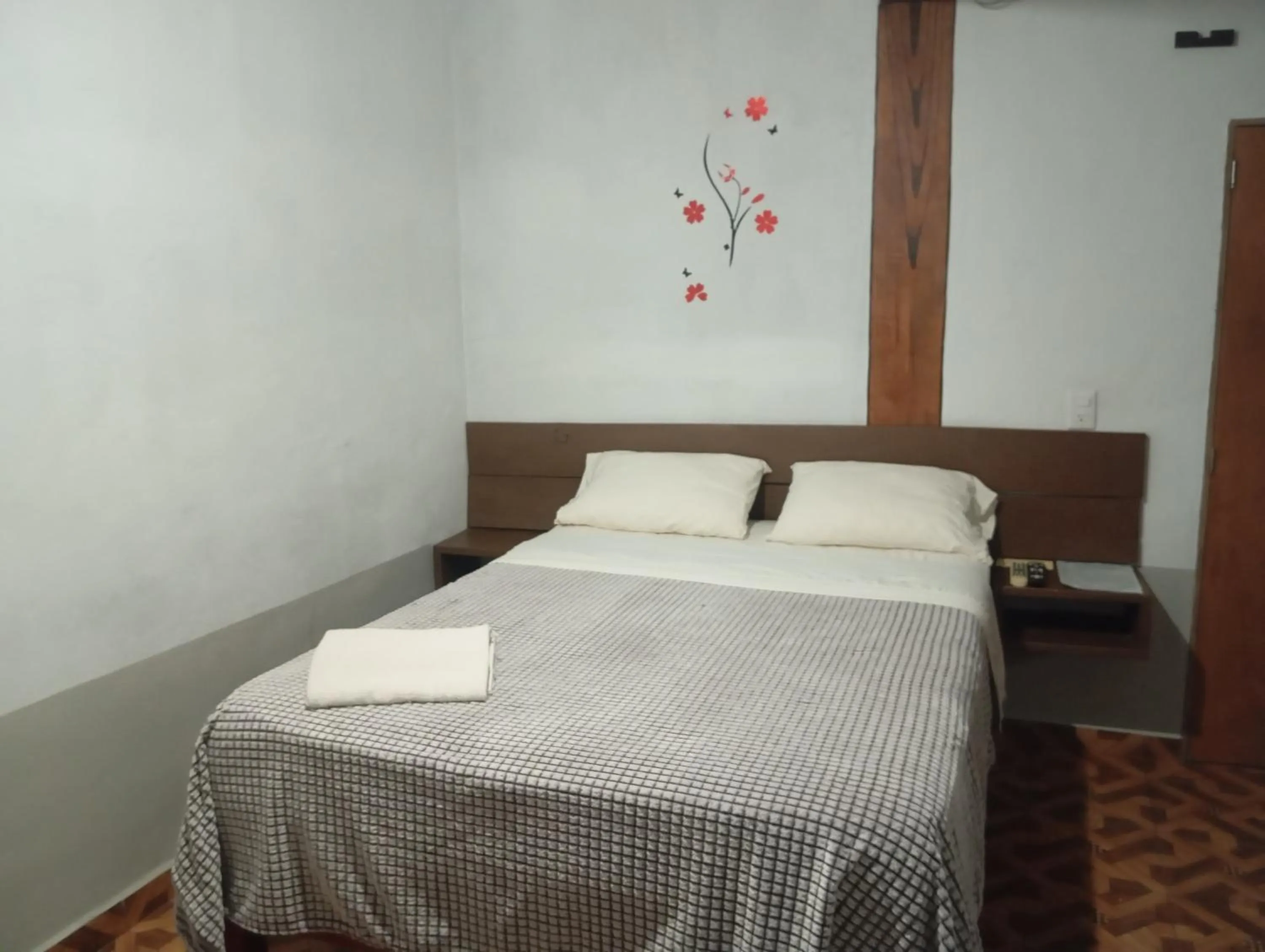 Bed in Hospedaje San Antonio Tepoztlán.