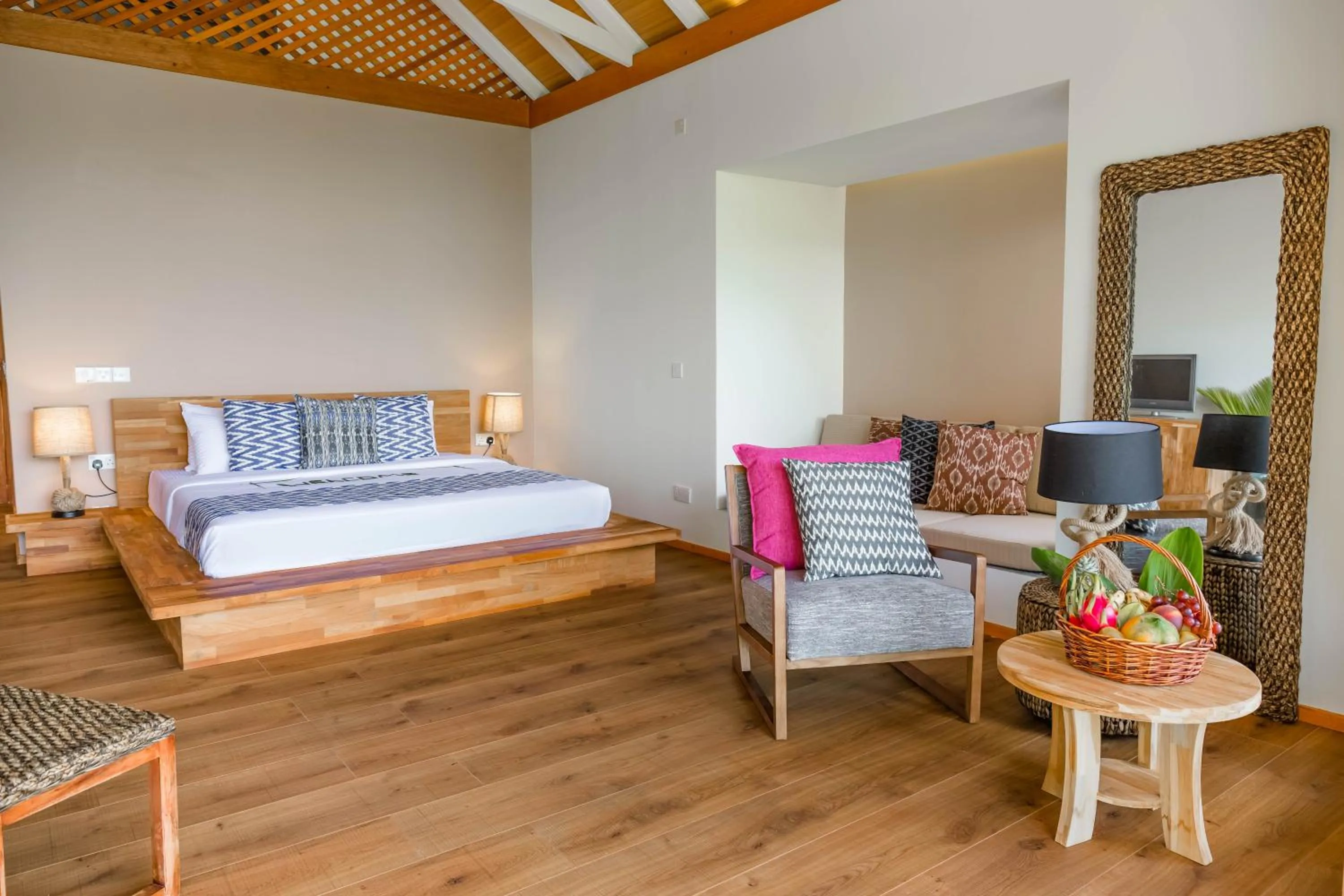 Seating area, Bed in Kudafushi Resort & Spa