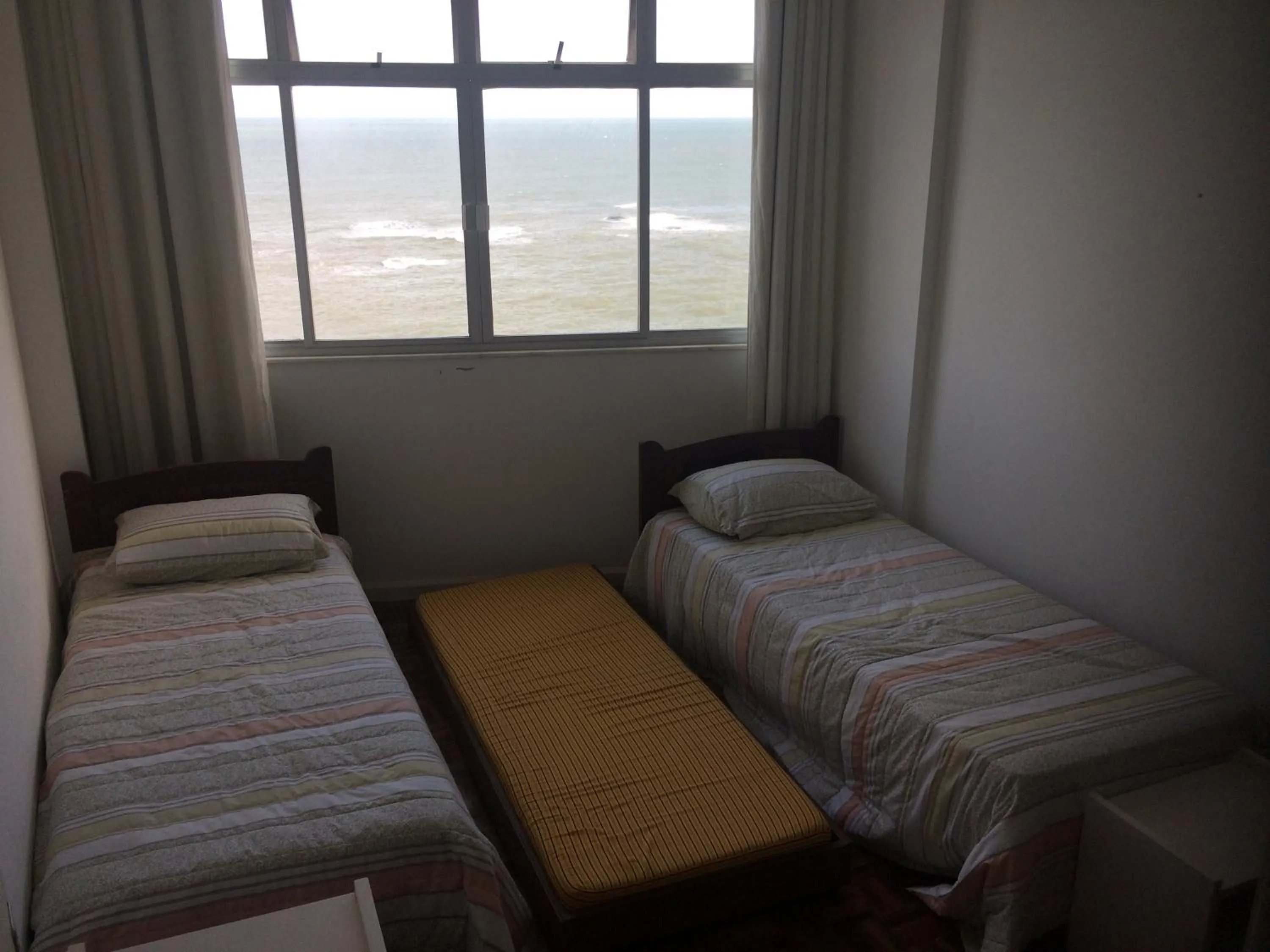 Bedroom, Bed in Apartamento Guarapari Brisa do Mar