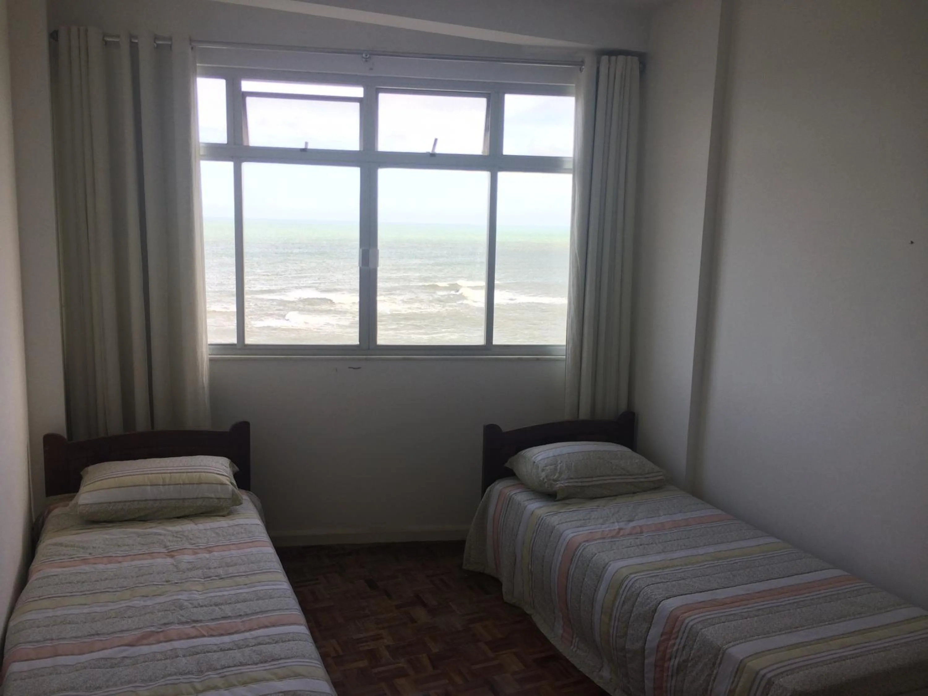 Bedroom, Bed in Apartamento Guarapari Brisa do Mar