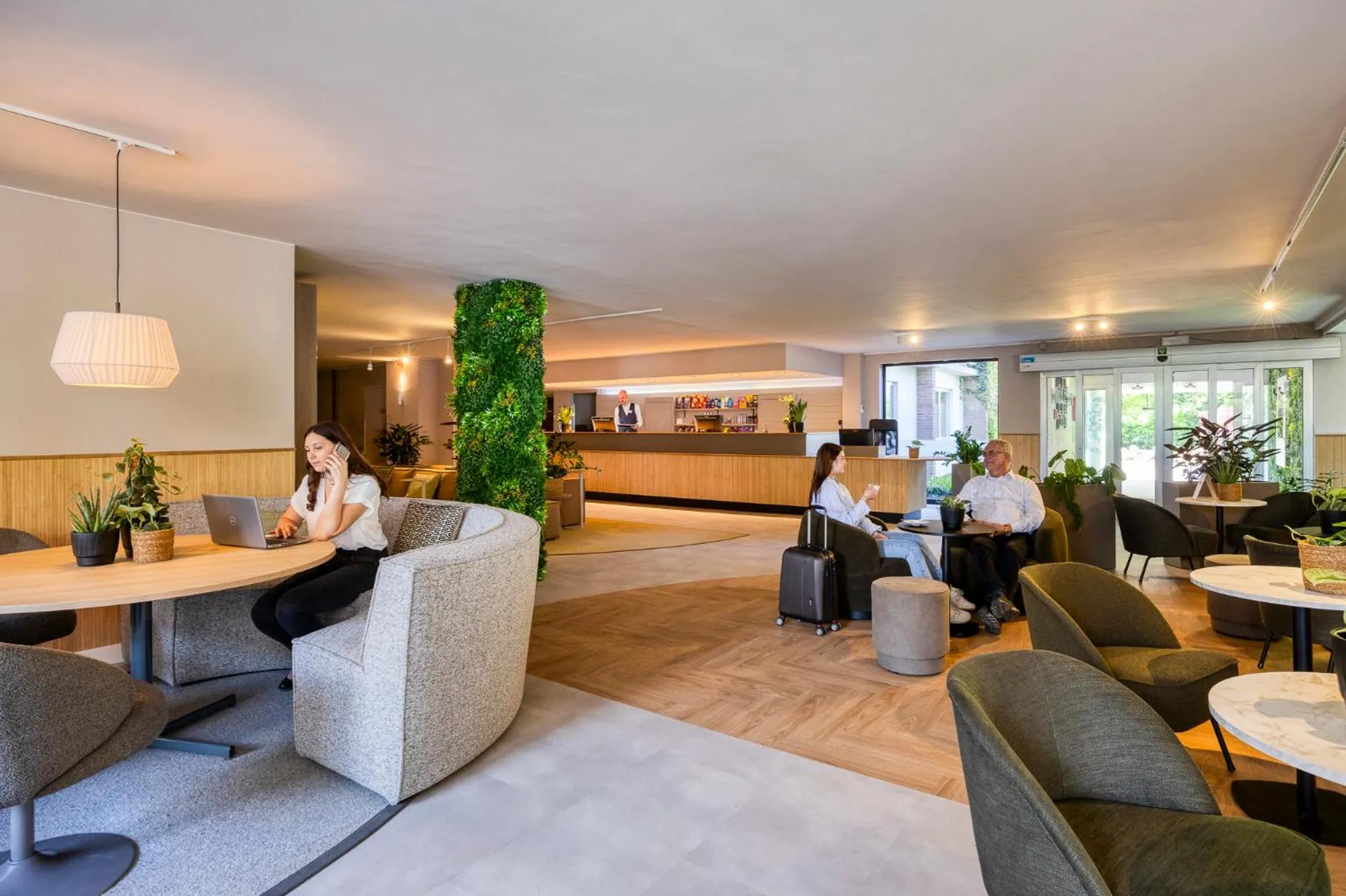 Communal lounge/ TV room in Green Park Hotel Brugge