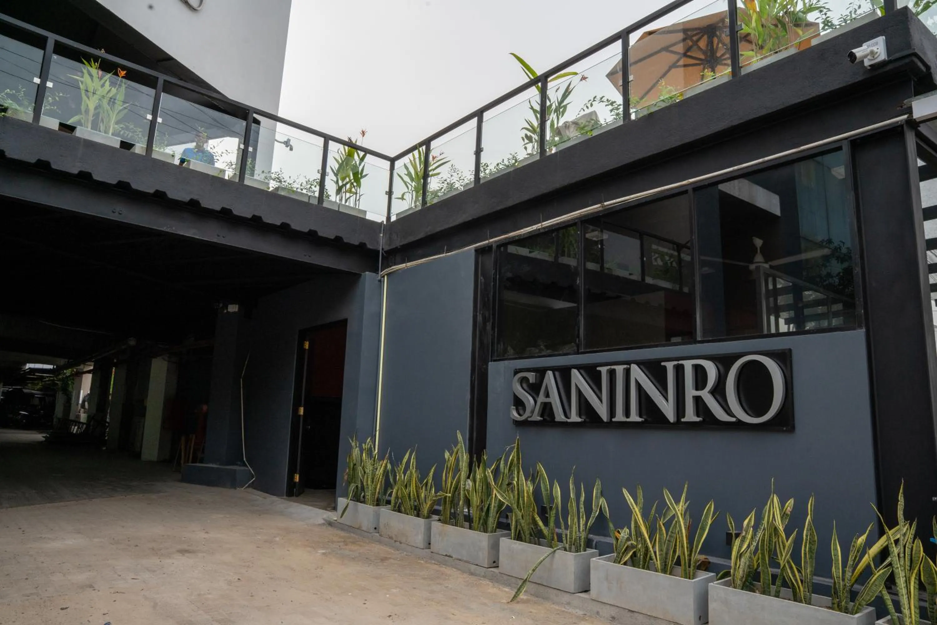 Property logo or sign in Saninro Hotel - Ragama