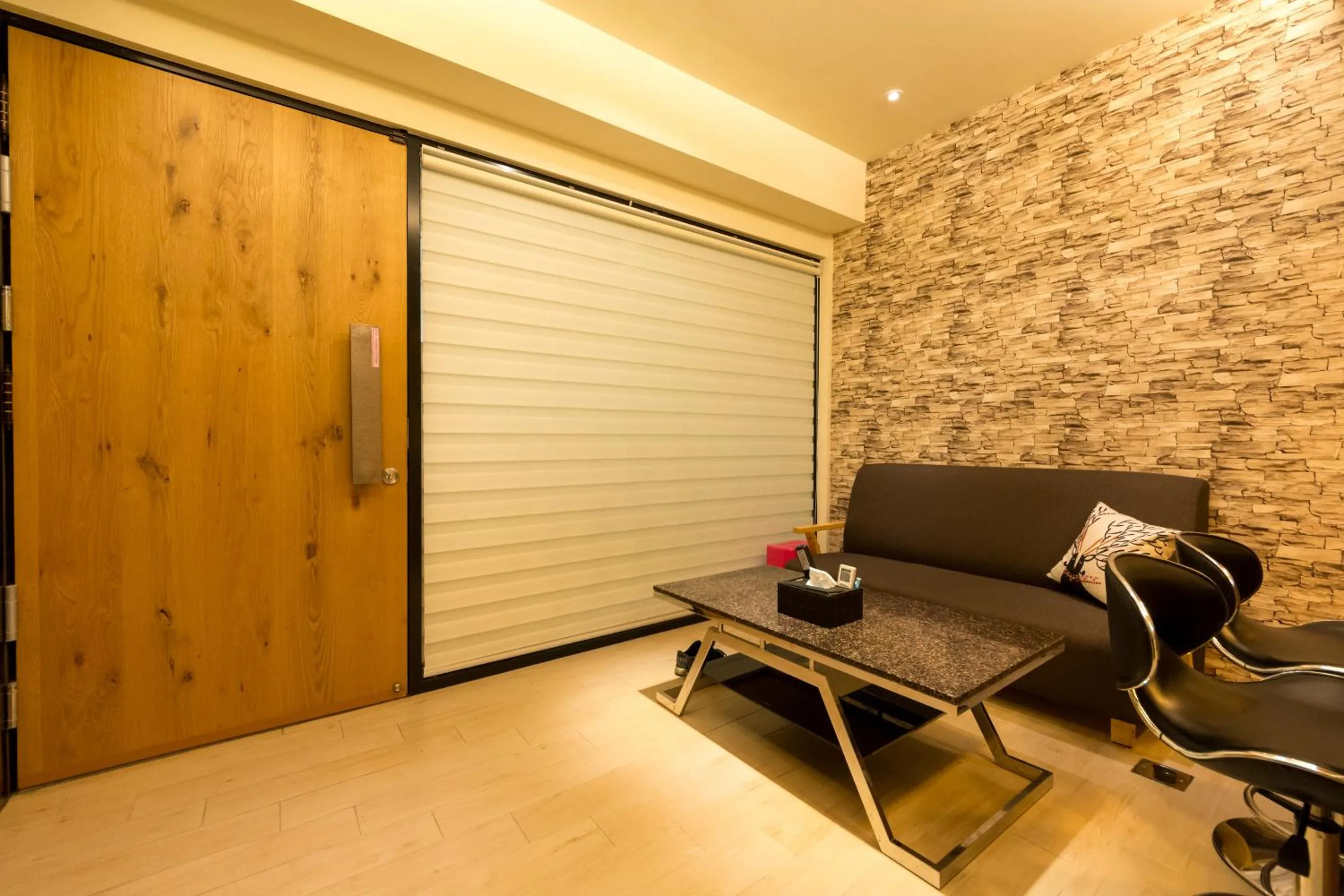Communal lounge/ TV room in W Hostel