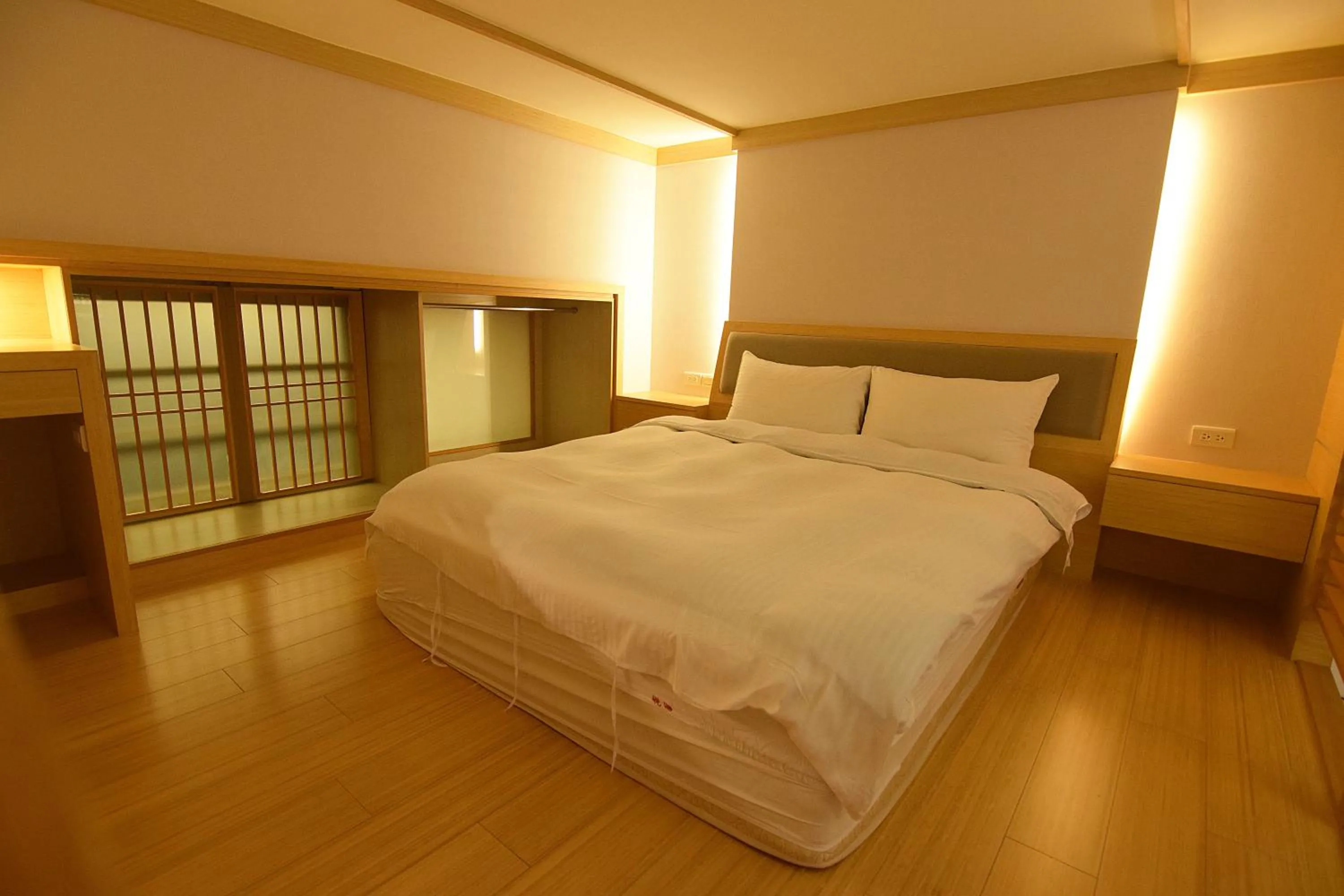 Bed in No. 21 Jiaoxi Hot Spring Homestay