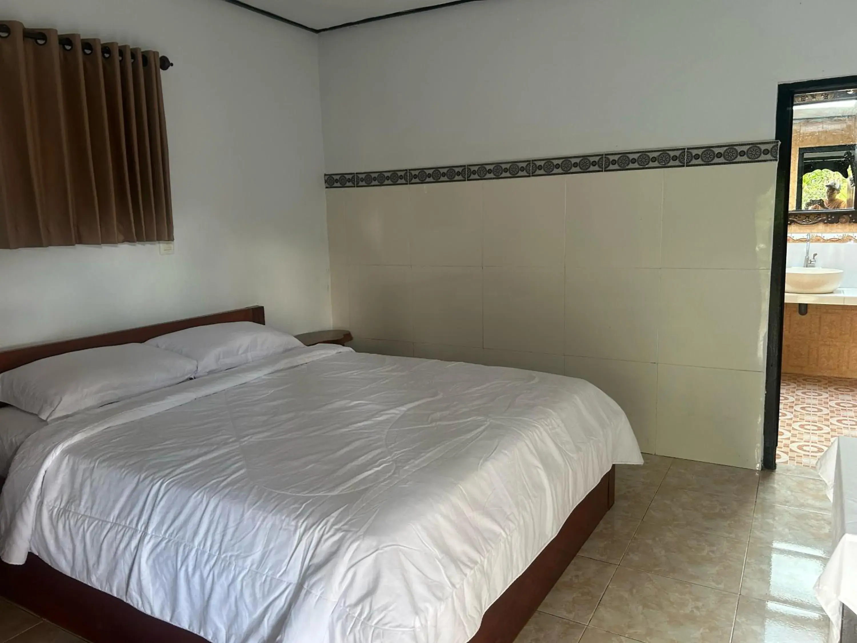 Bed in Darma Putra Hotel Bed in Darma Putra Hotel