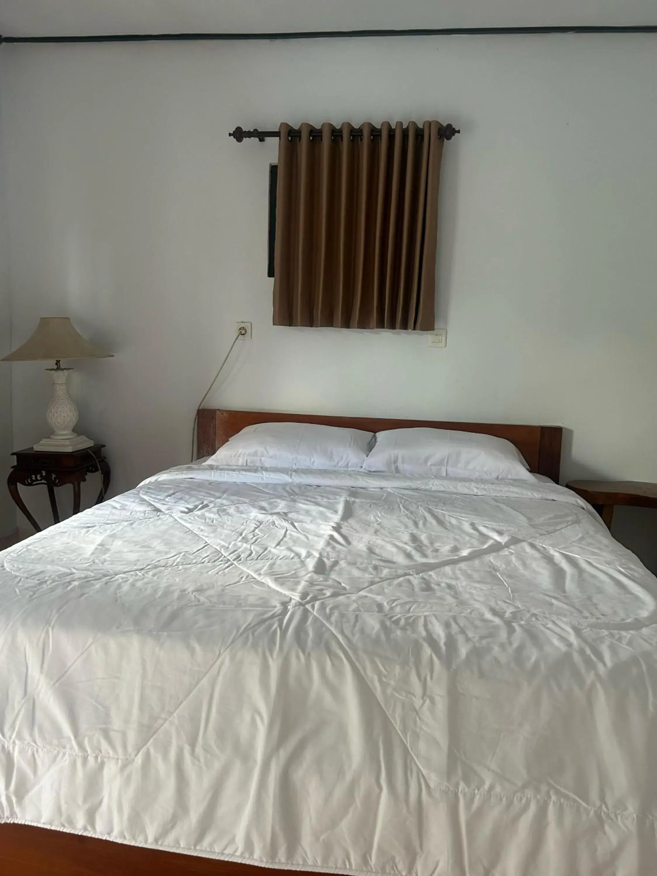 Bed in Darma Putra Hotel Bed in Darma Putra Hotel