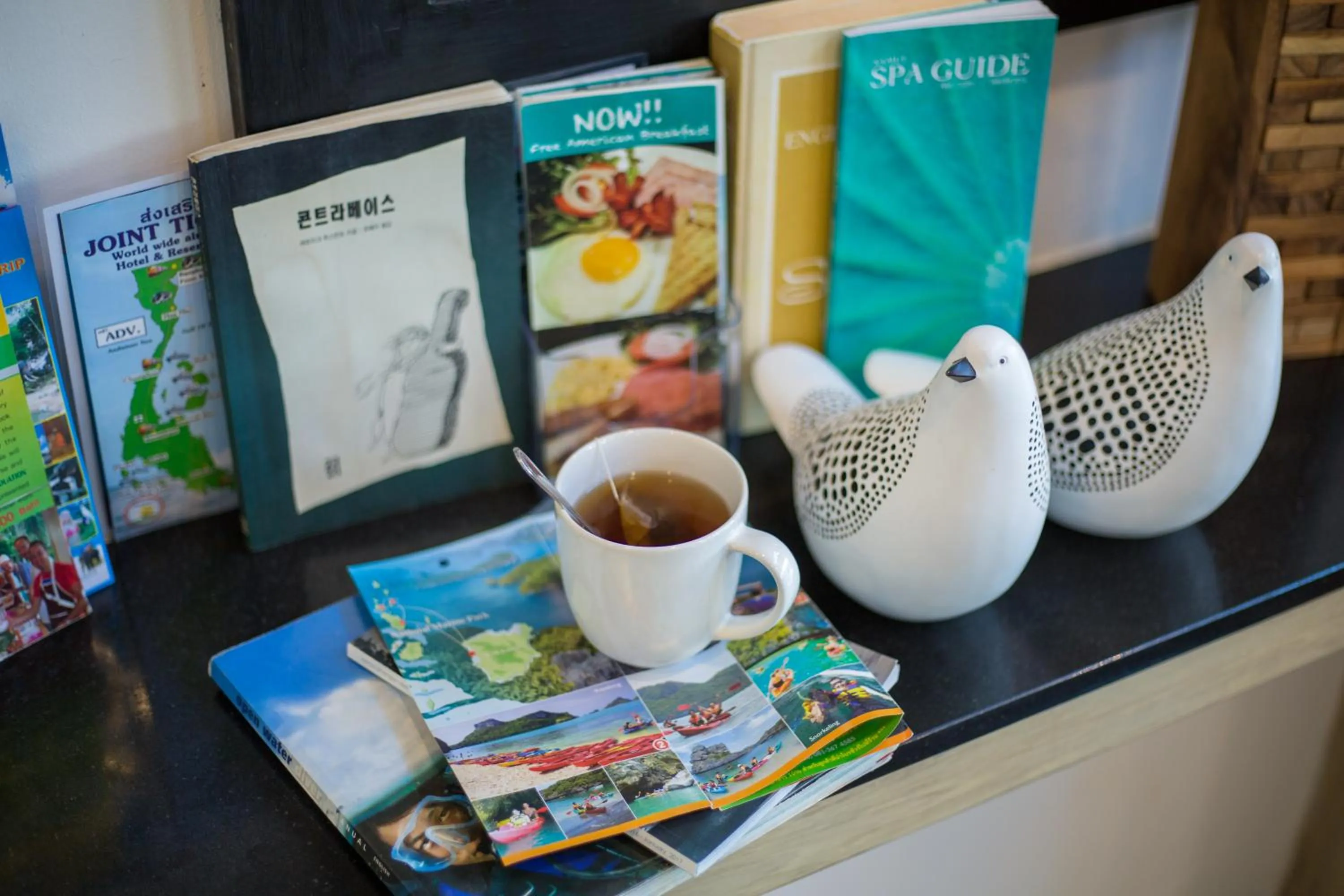 Communal lounge/ TV room in P168 Hostel Samui