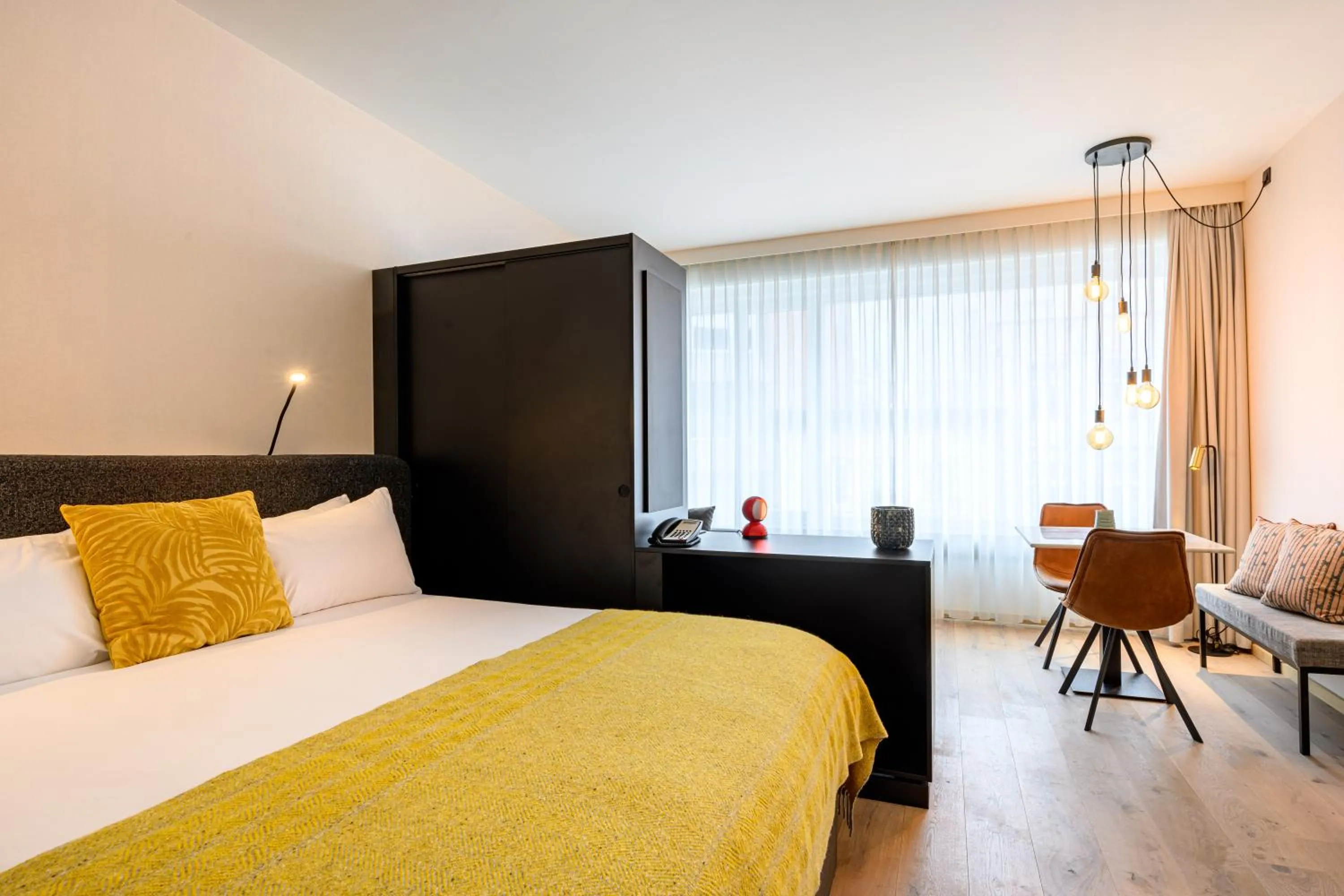 Bed in PREMIER SUITES Antwerp