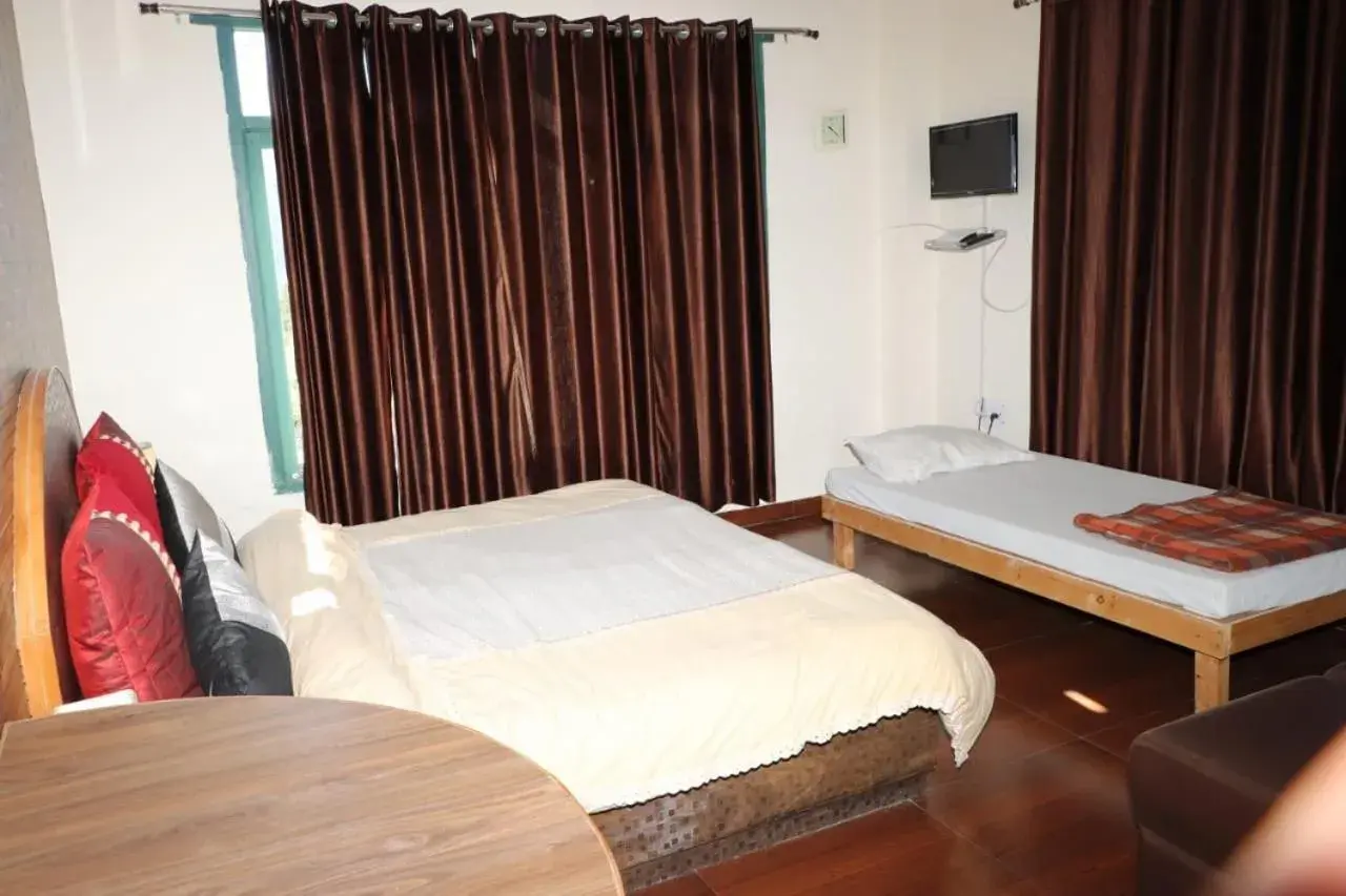 Comfort Quadruple Room in Trimurti Pine Valley Resort Comfort Quadruple Room in Trimurti Pine Valley Resort
