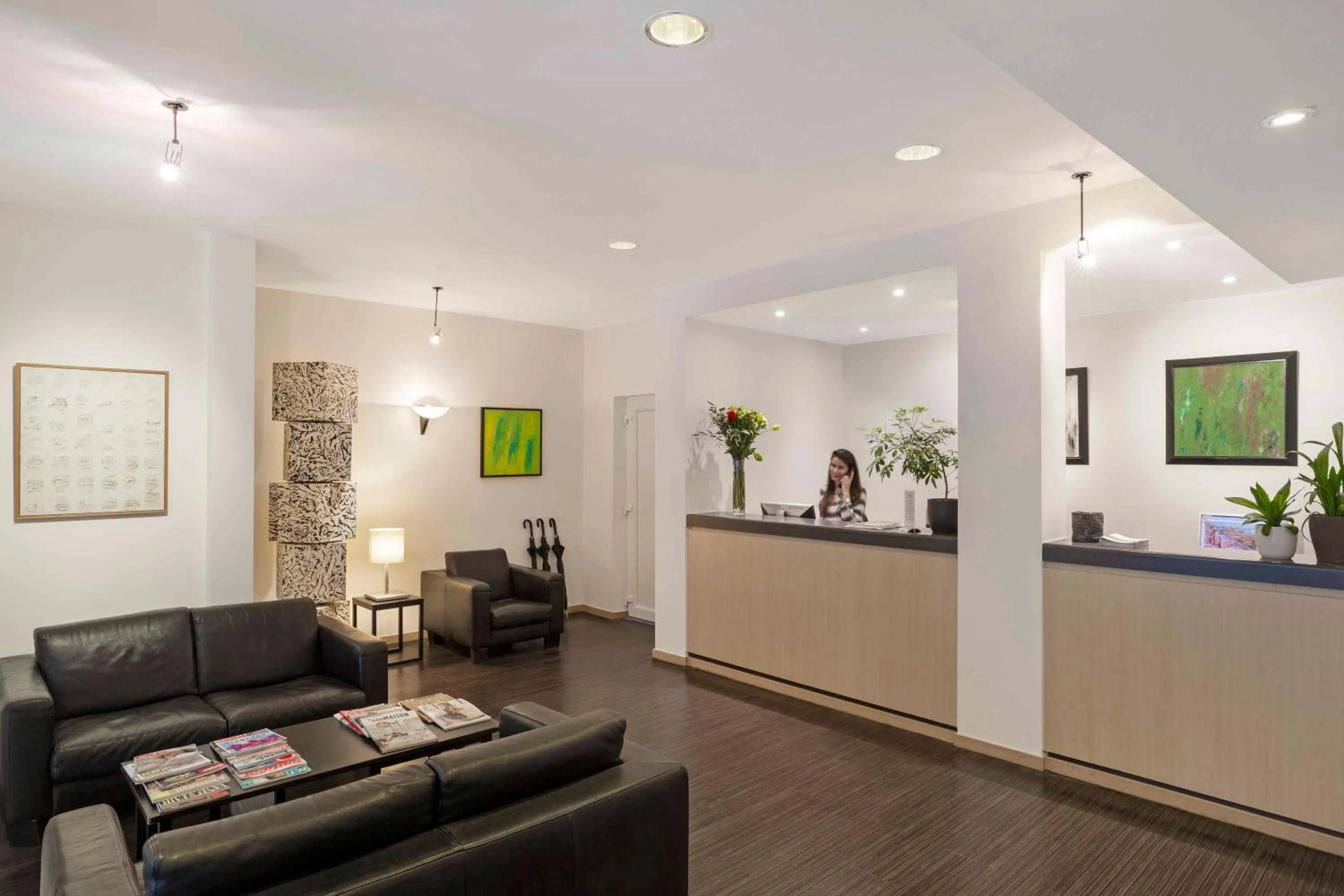 Lobby or reception in Hôtel Argus by happyCulture