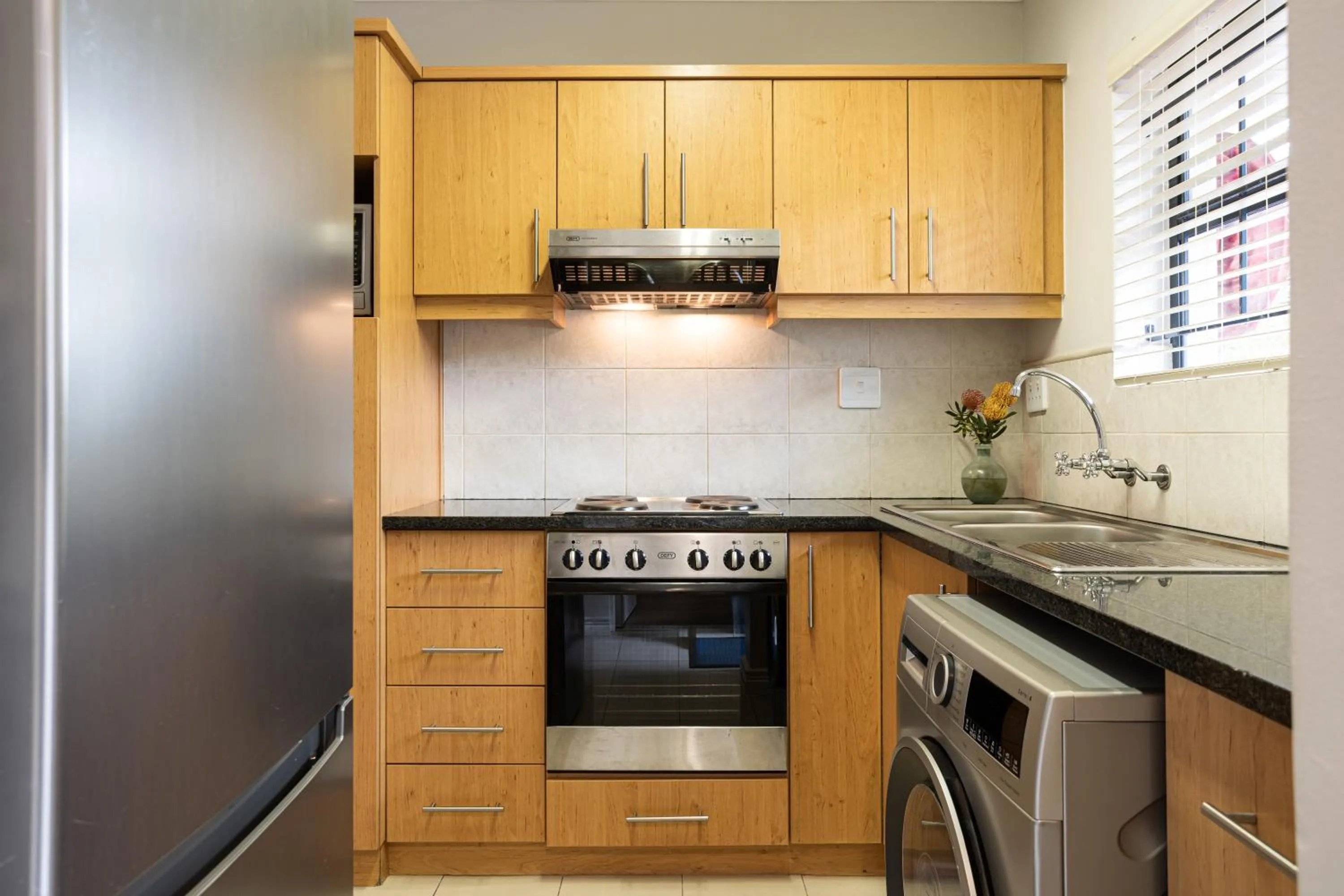 kitchen in Vino Self Catering Apartment
